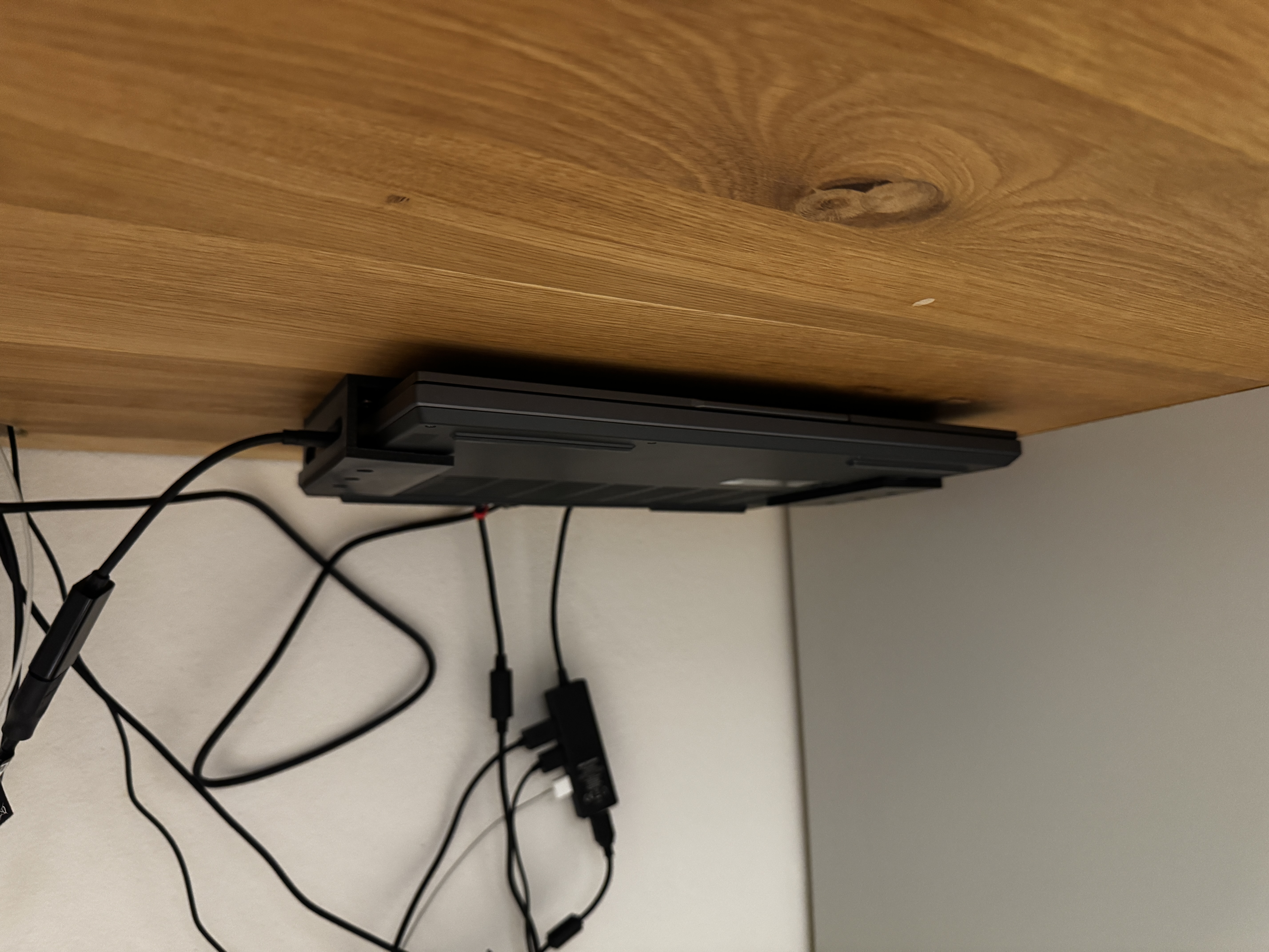 Laptop holder under a desk