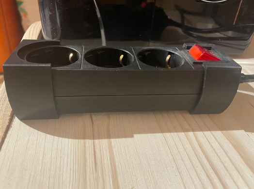 Halterung für Steckdosenleiste, Power strip