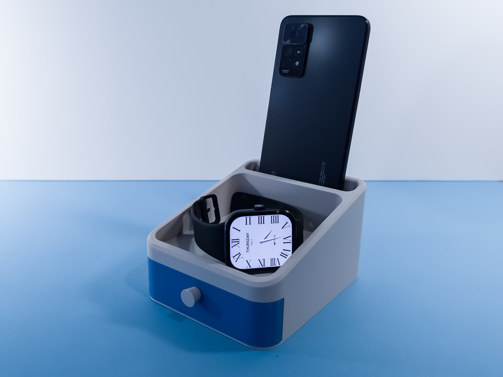 Tray with drawers and mobile phone holder