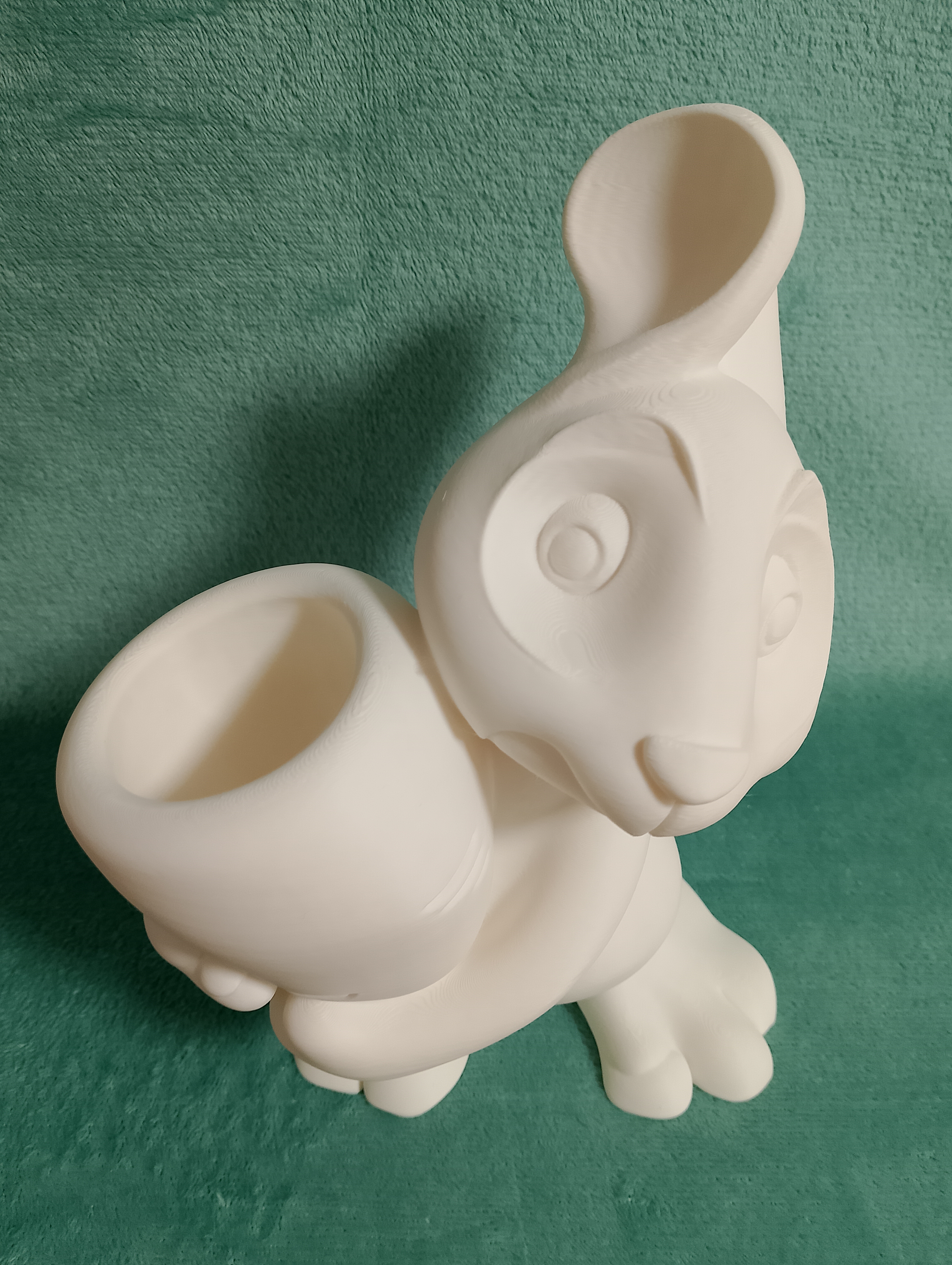 A rabbit with carrots - garden decor