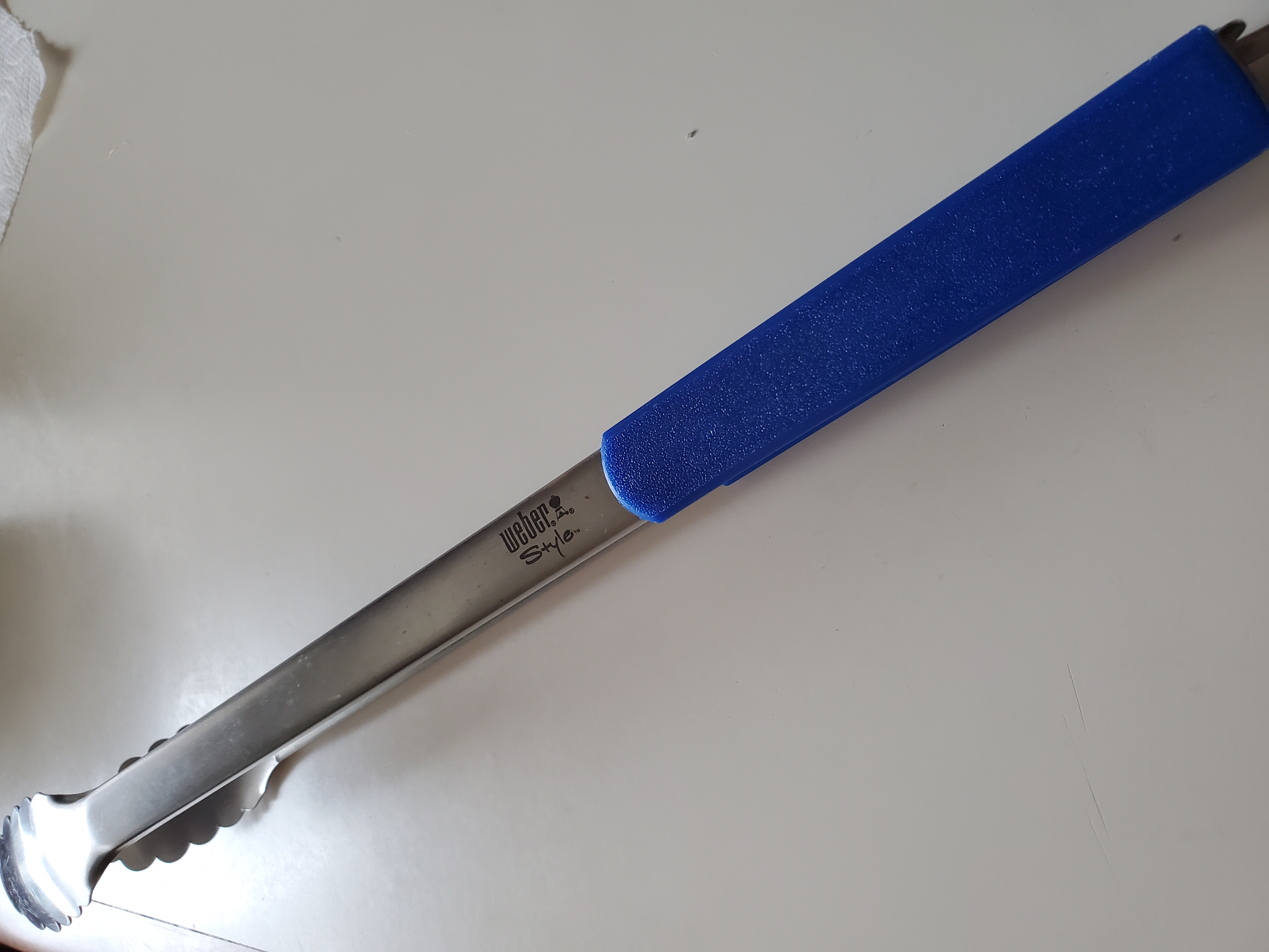 Weber tong grip