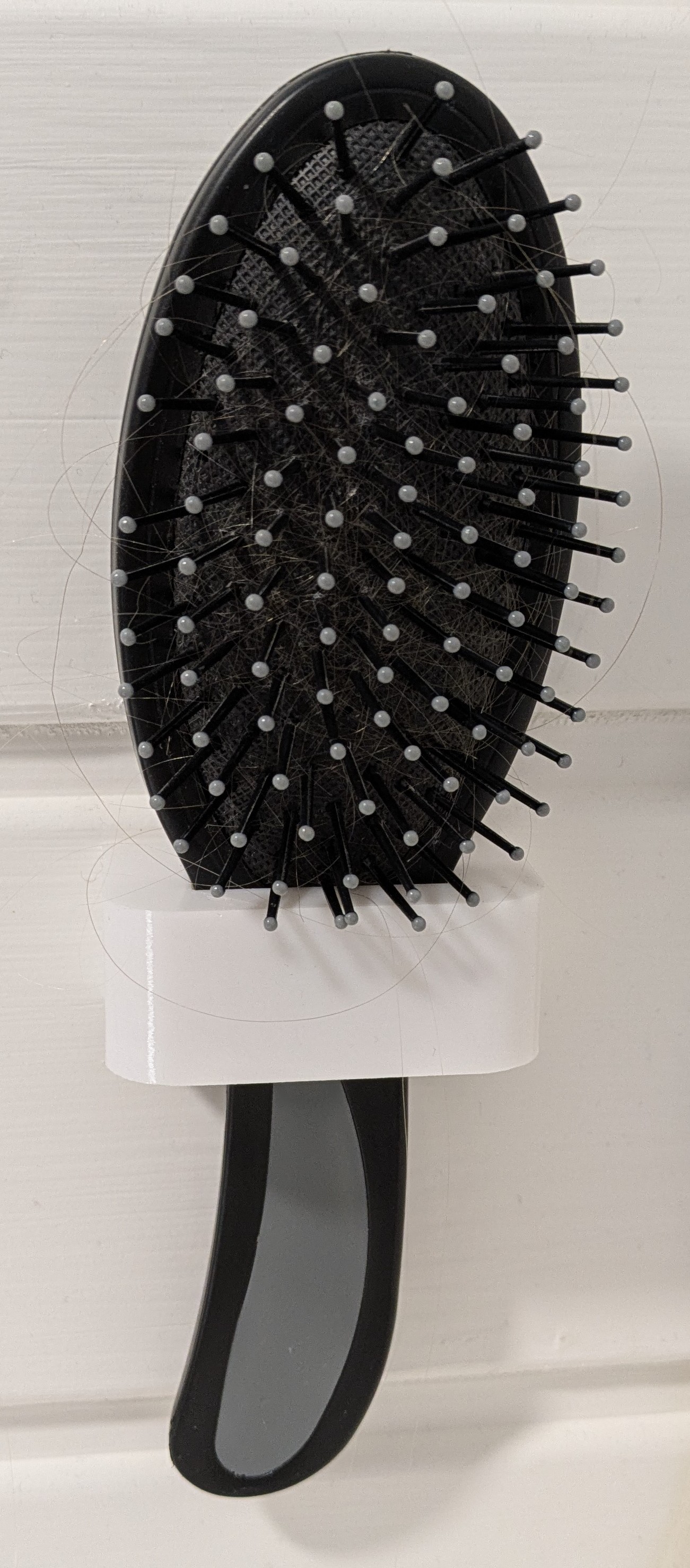 Hairbrush wall holder