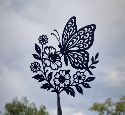 Flying Butterfly Over Flowers
