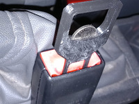 UK 5p Bottle Opener Seatbelt Silencer
