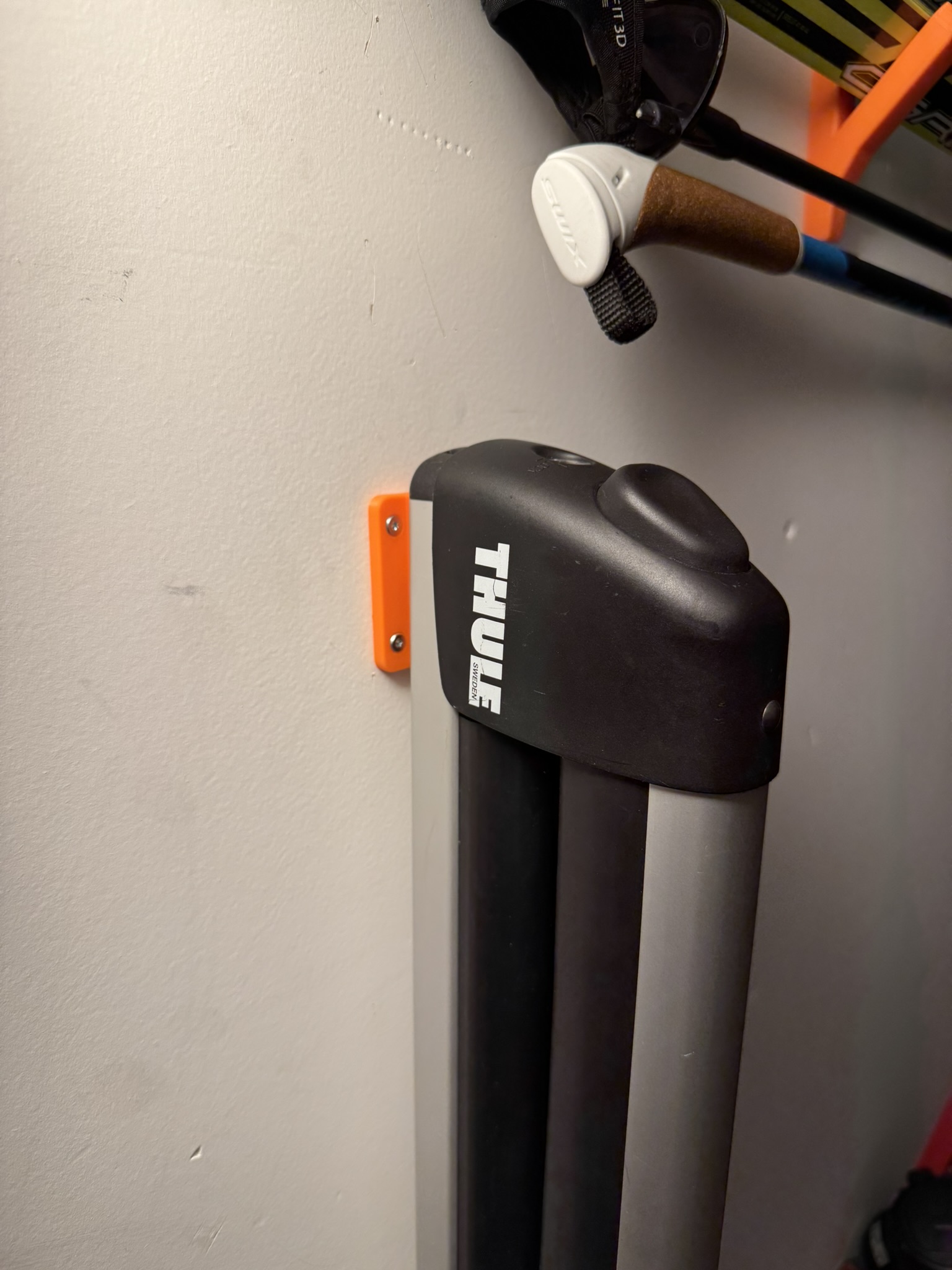 T-slot wall mount for bike, ski and kayak mounts