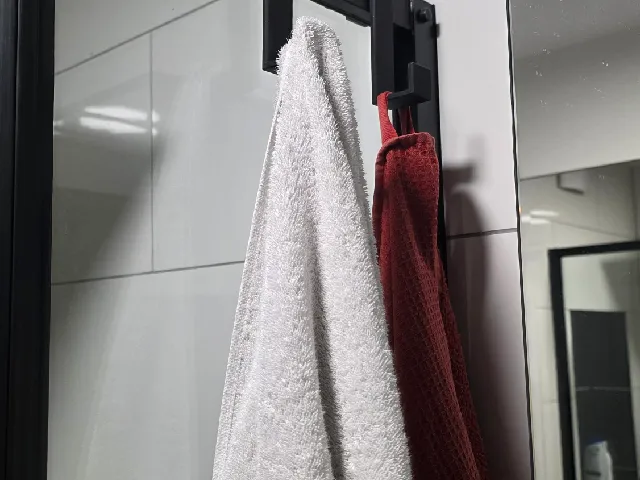 Shower cabin towel hanger