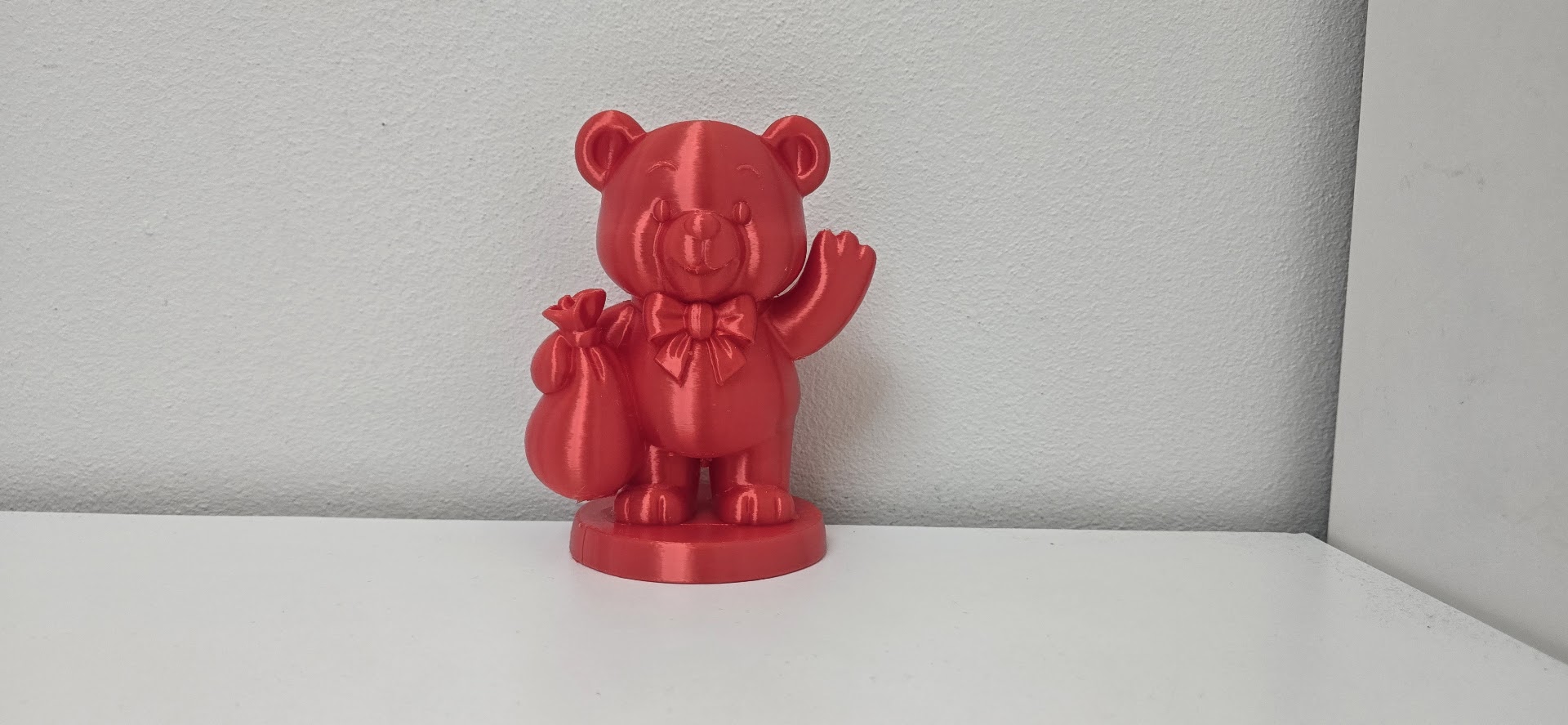 Waving Teddy Bear with Gift Sack Christmas Figurine