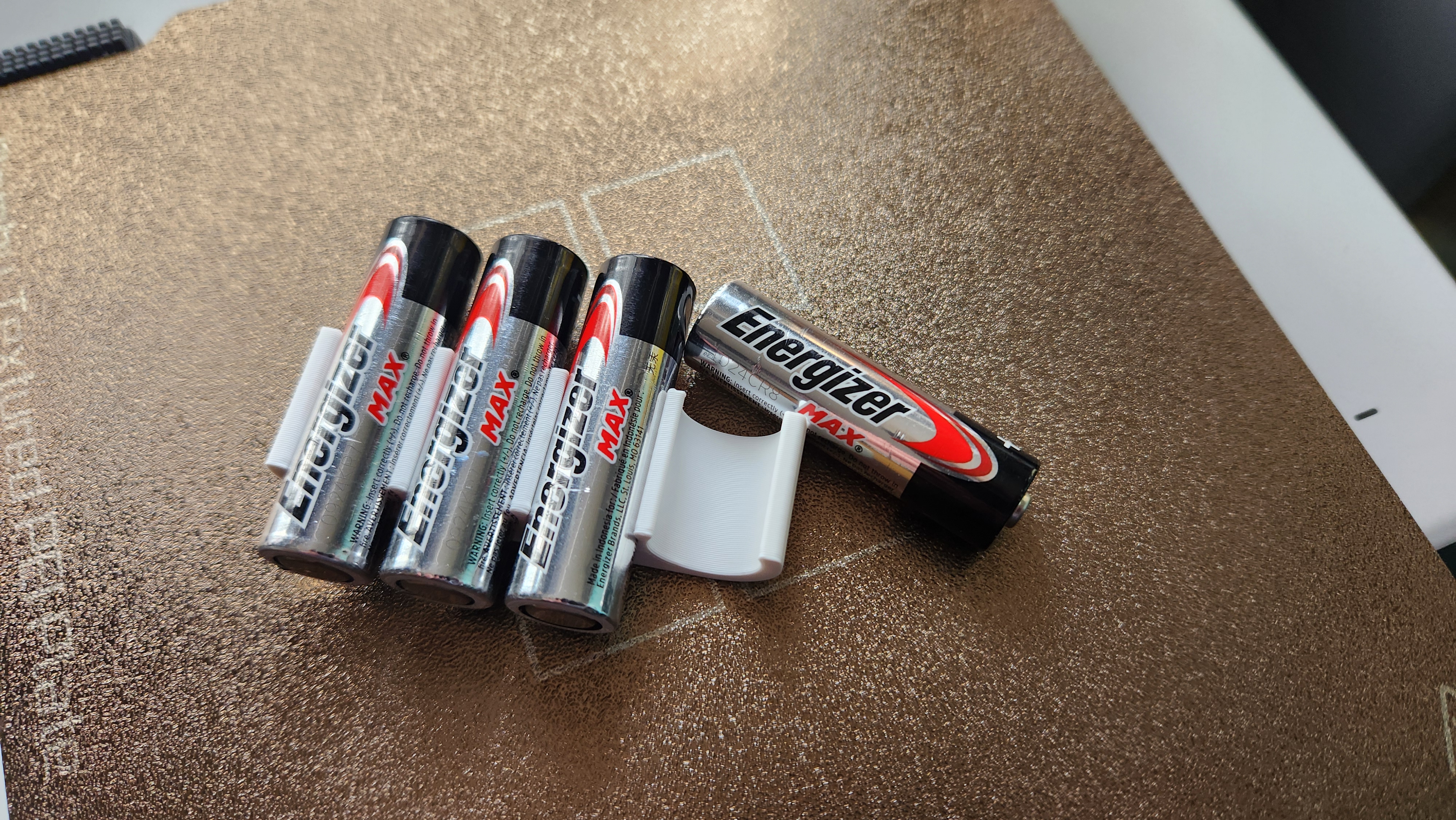 Simple AA Battery Clip | Holds 4 Batteries 3D model