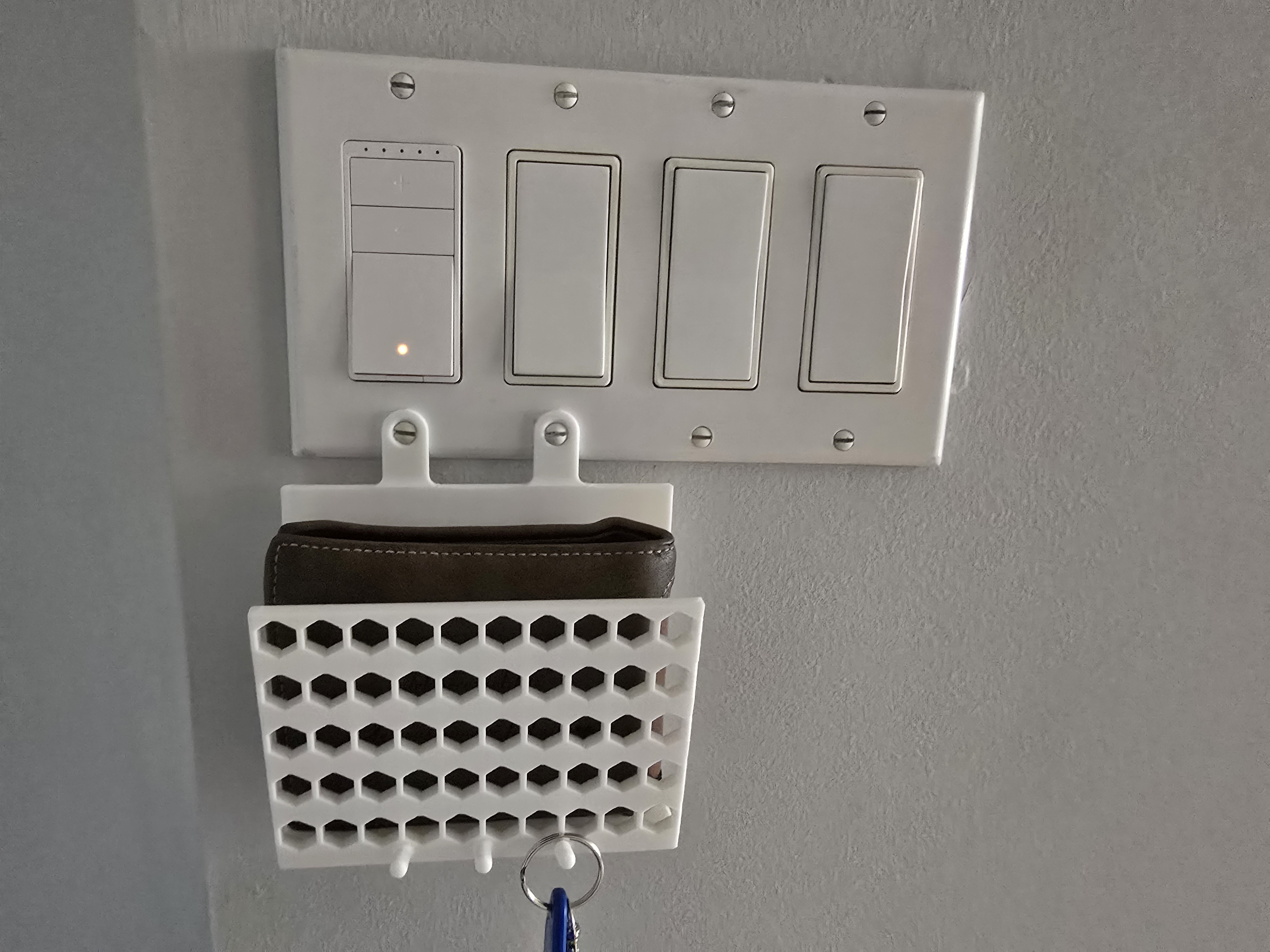 Wallet and Key holder for lightswitch wall plate