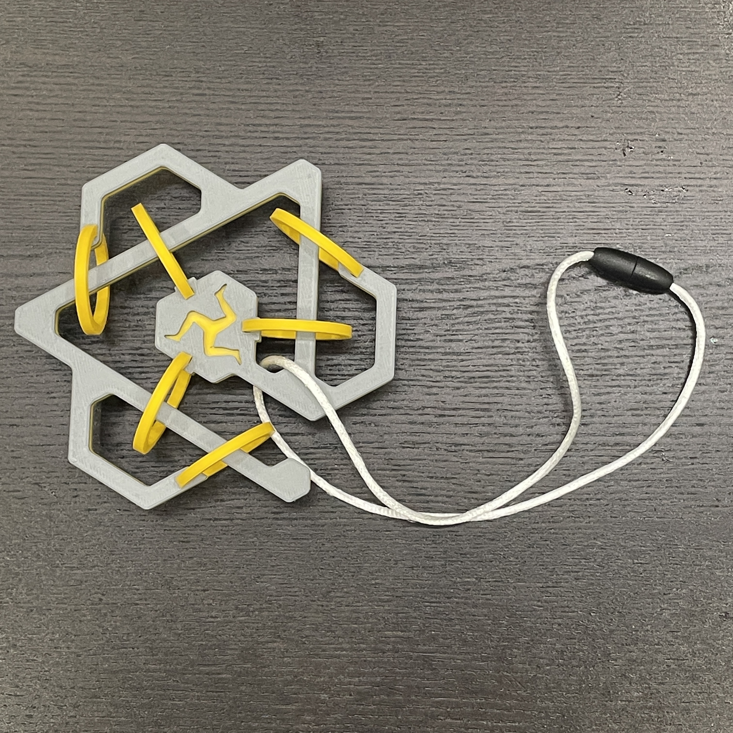 Tricky Ternary Triskeles (TTT) Puzzle
