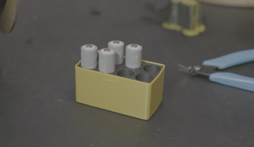 Foaming insert battery holder