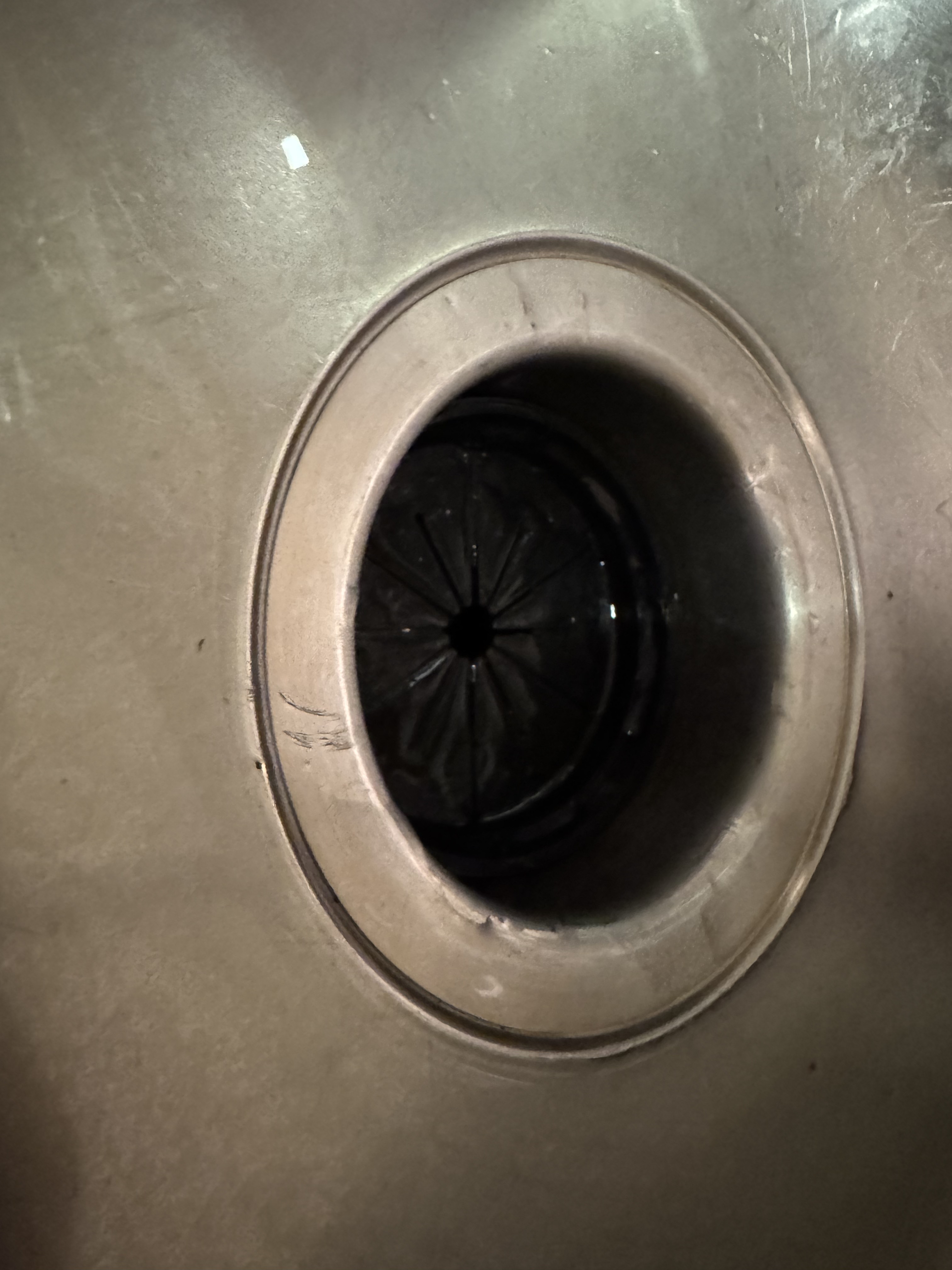 Flex splash guard for McAlpine food waste disposal unit