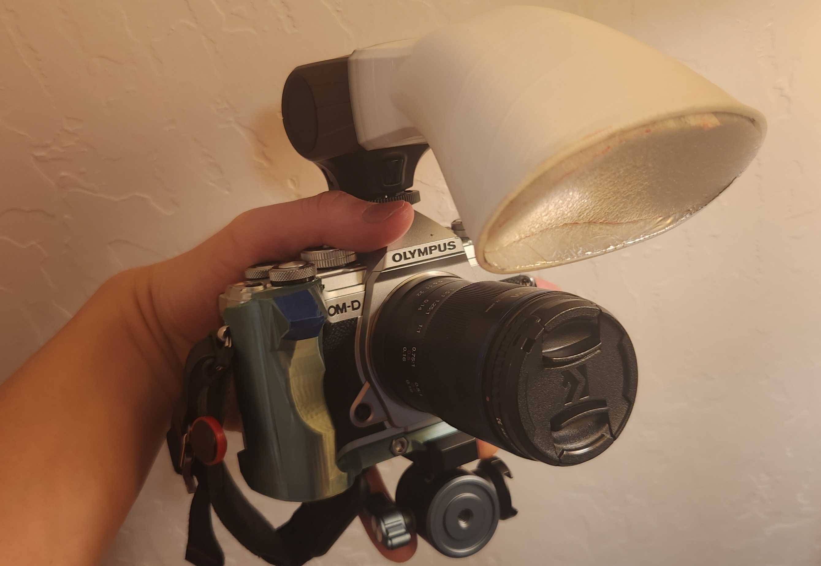 Olympus E-M5 III hand grip + arca swiss plate + clutch anchor
