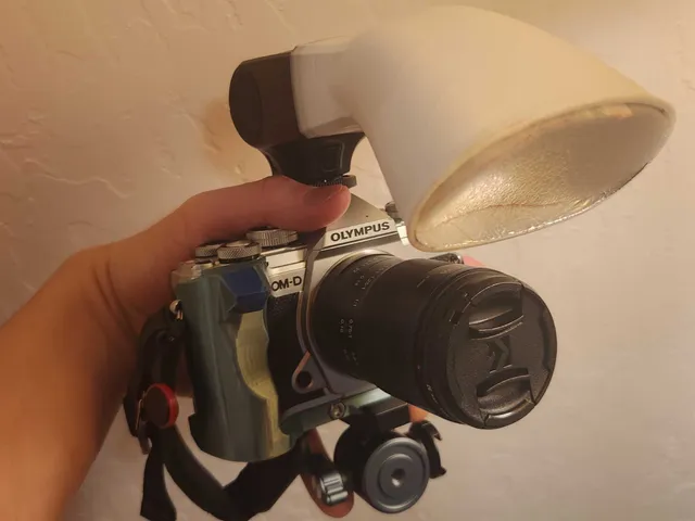 Olympus E-M5 III hand grip + arca swiss plate + clutch anchor