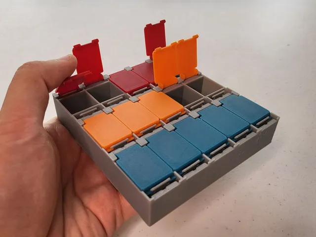 Small Components Spring-Tab-Release Organizer Concept