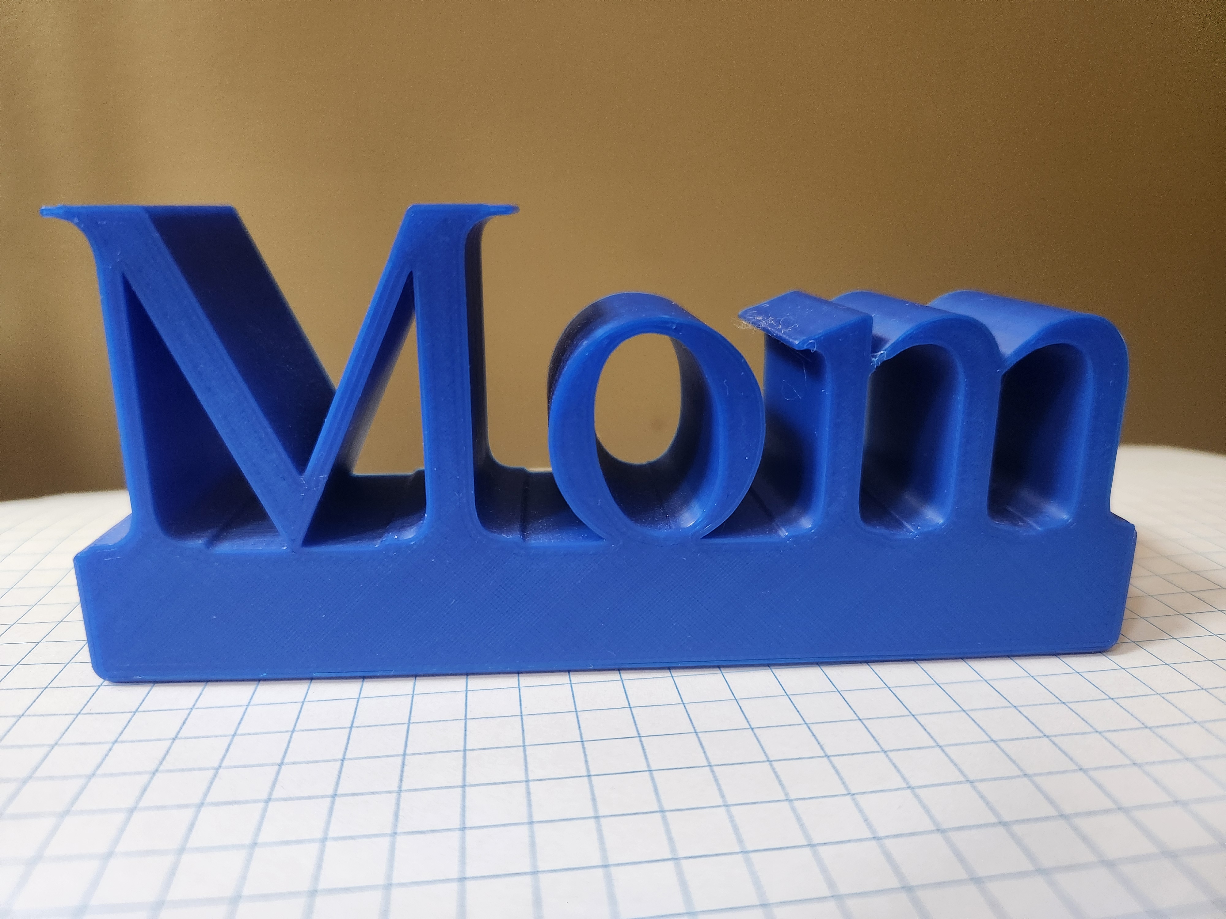 "Mom" sign