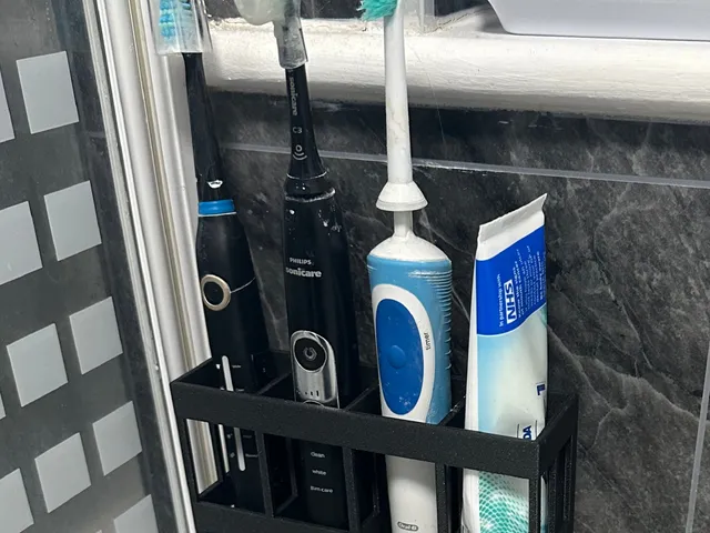 Electric toothbrush holder - no visible screws