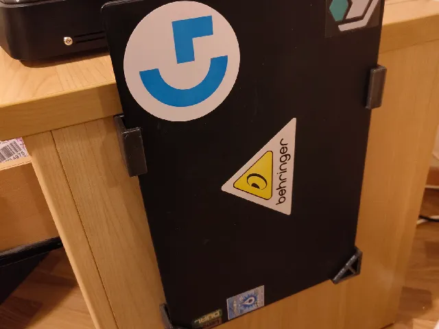Adjustable laptop wall mount