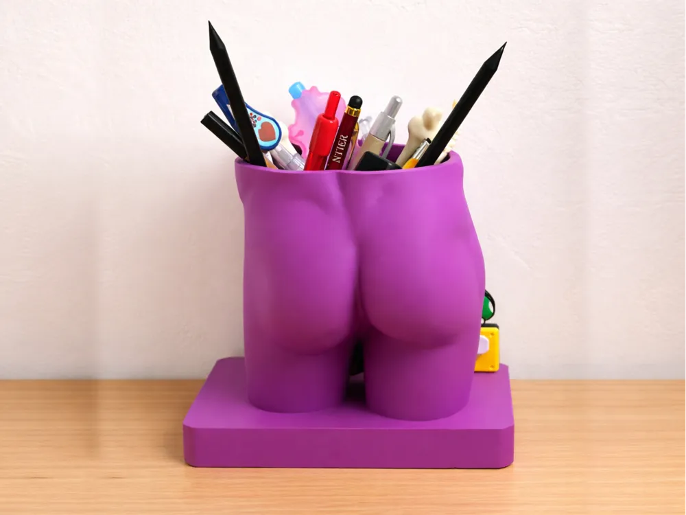A cheeky male booty pen holder