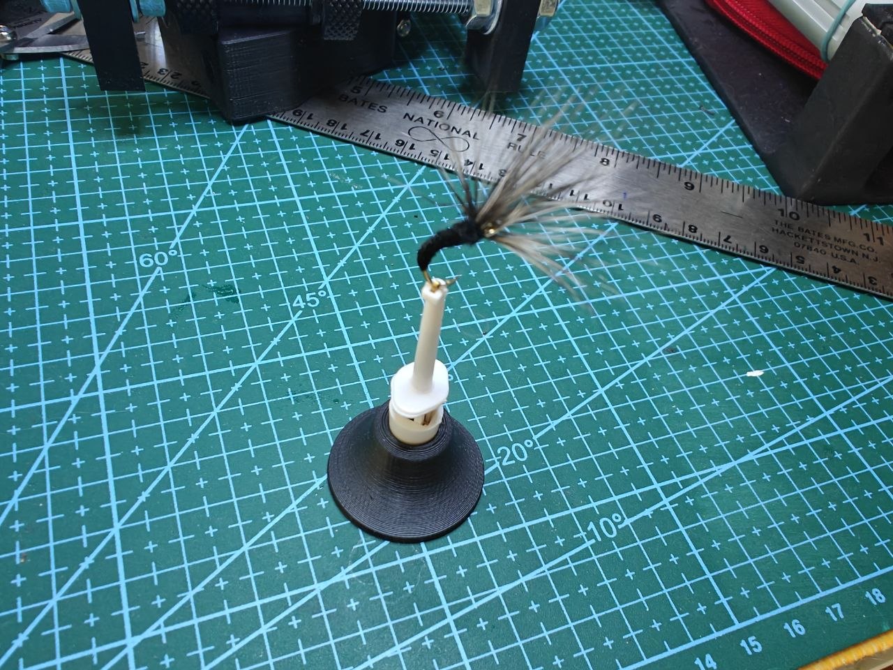 Base for the fly holder