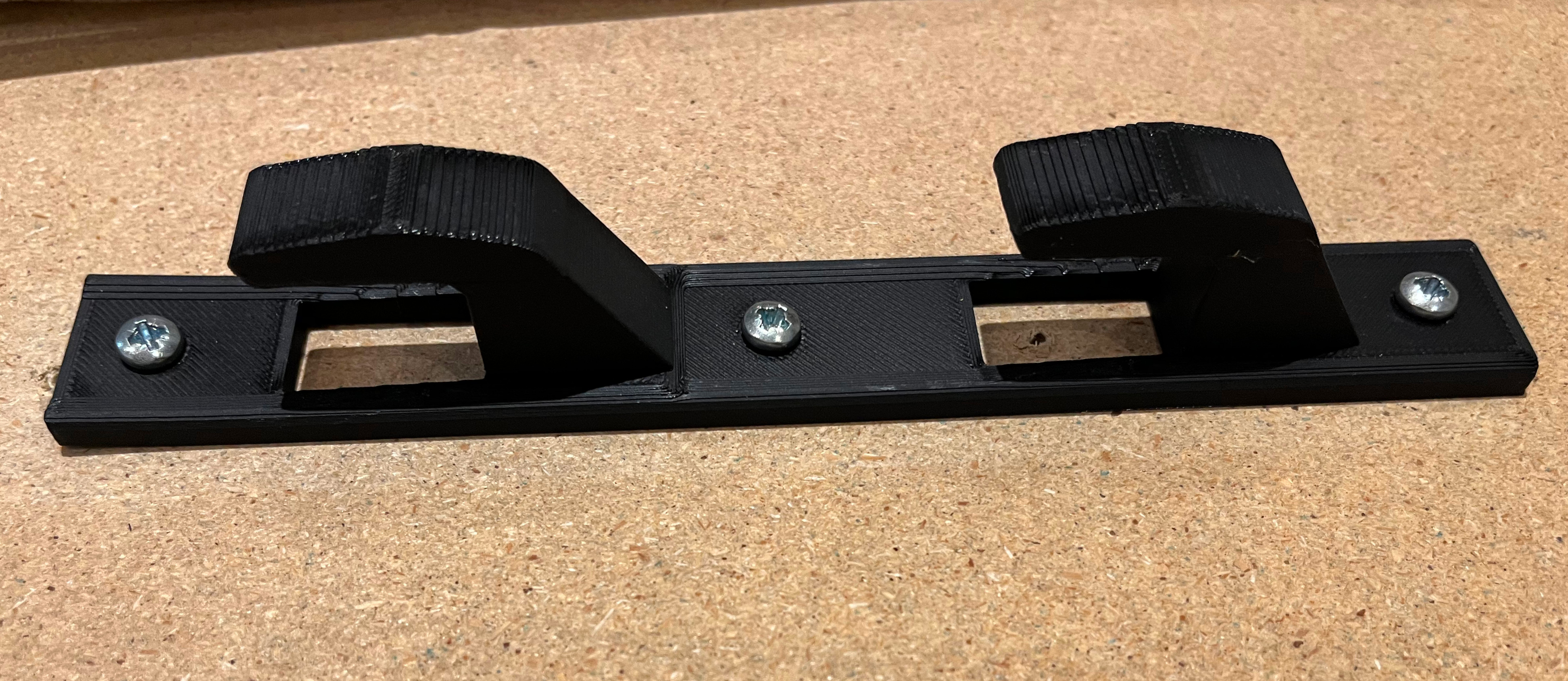 Ironingboard leg holder