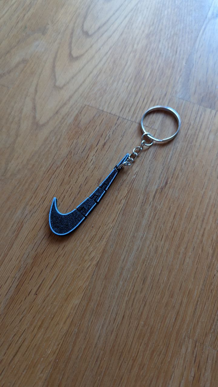Nike logo flexi keychain