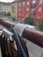 Balcony cable holder