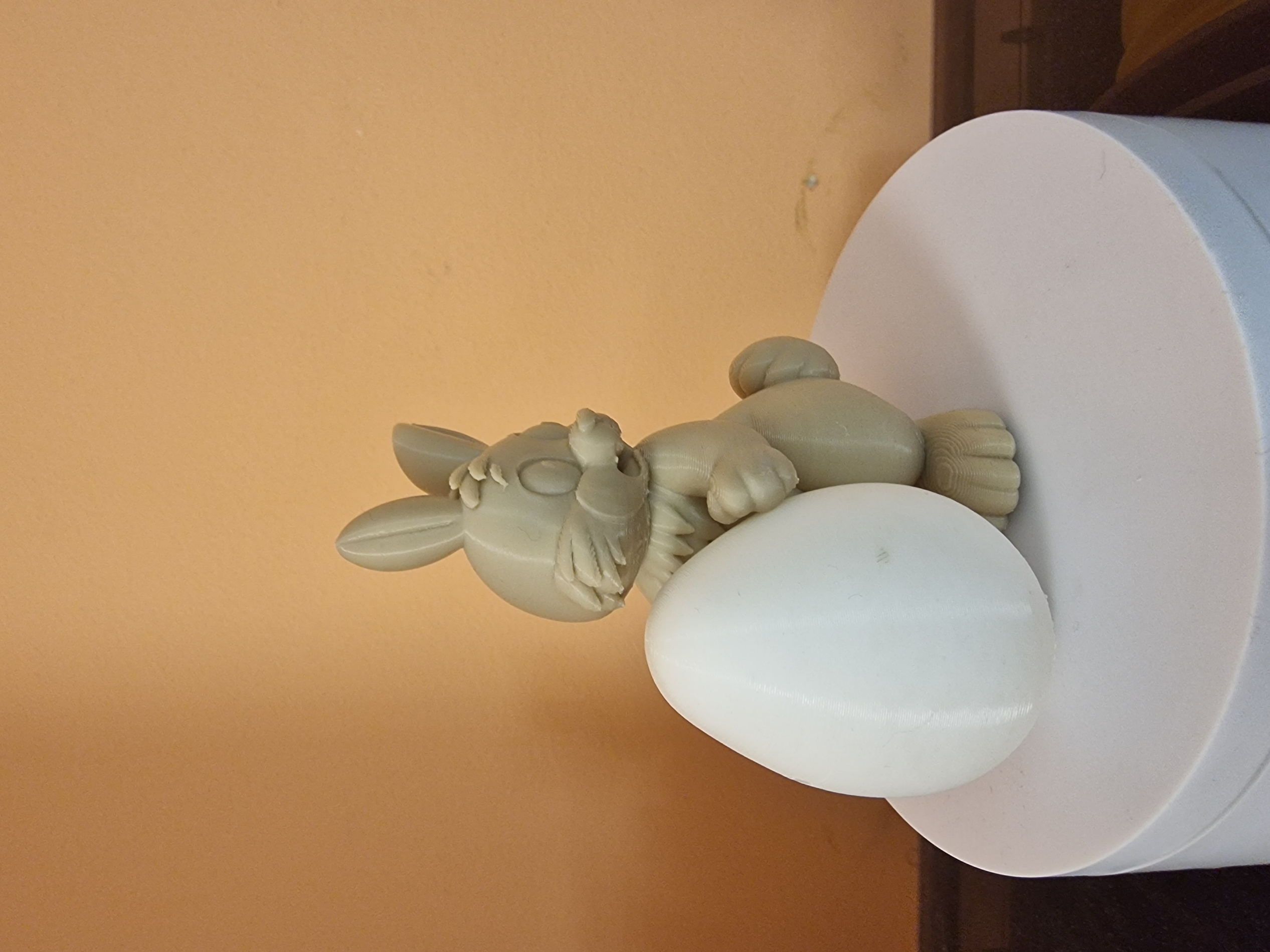 Surprised bunny with an egg