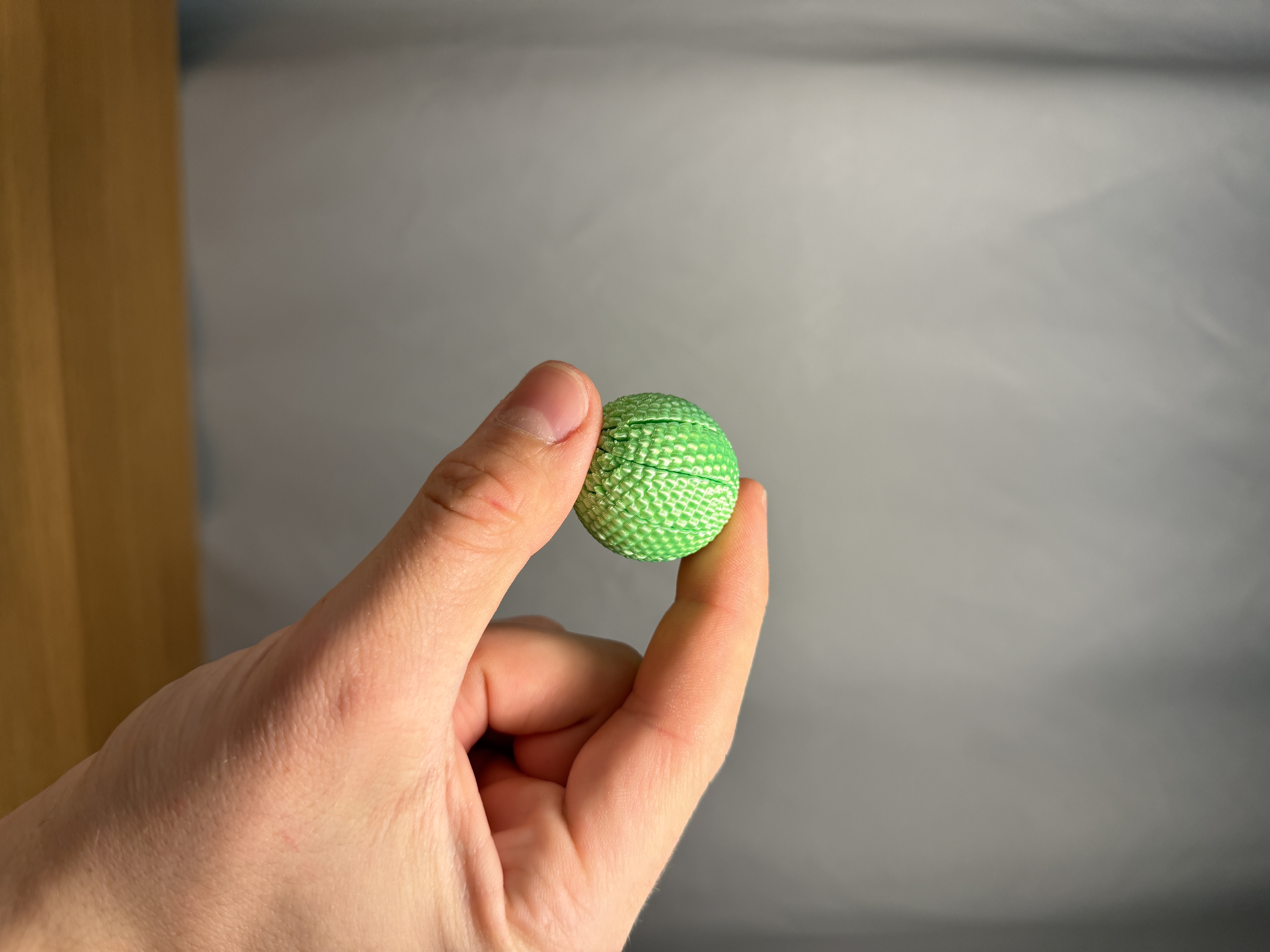 Miniatura 3 do modelo 3D Mini Rounded Sensory Sphere Twisty Fidget Toy