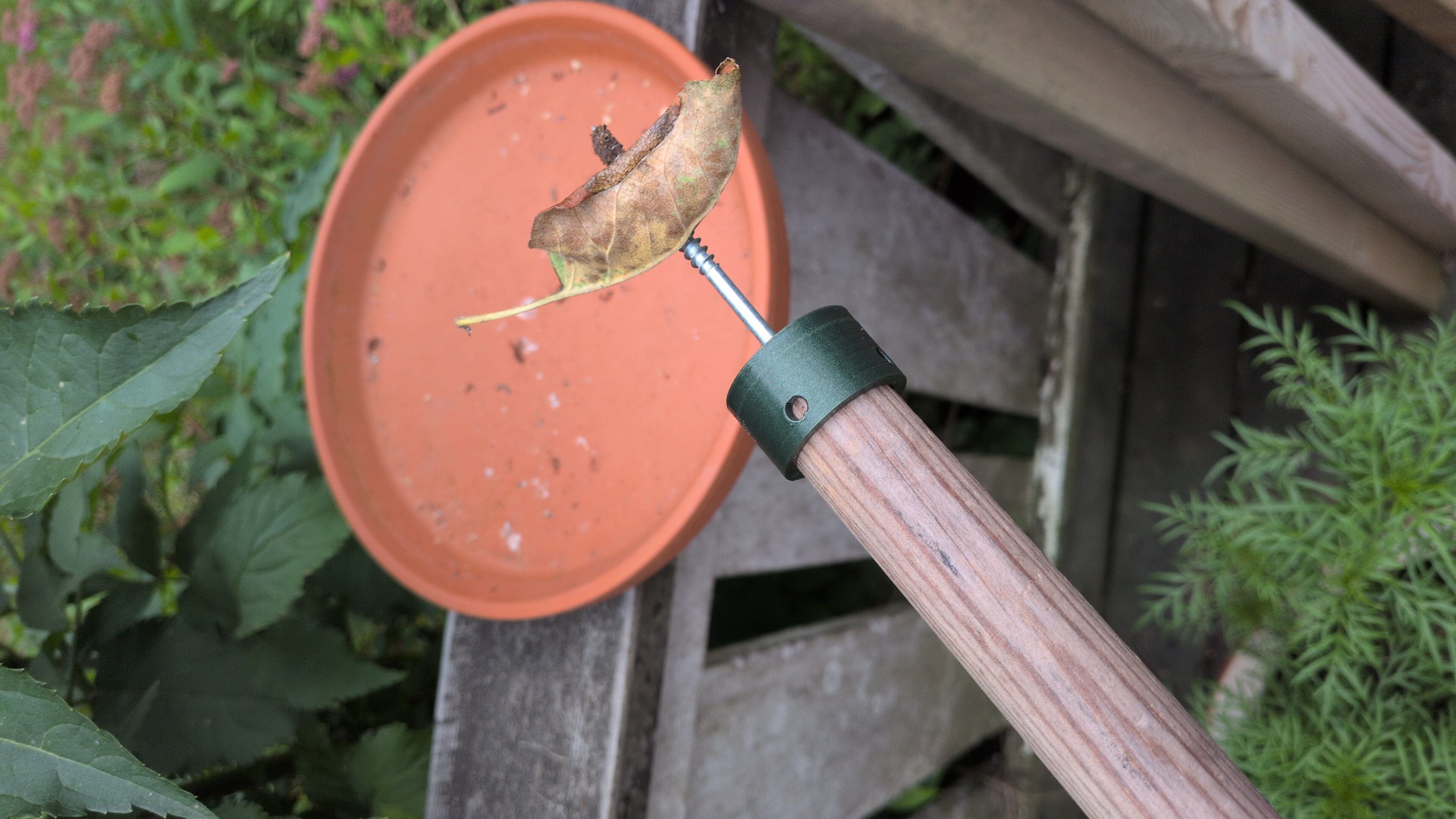 Trash stick end cap