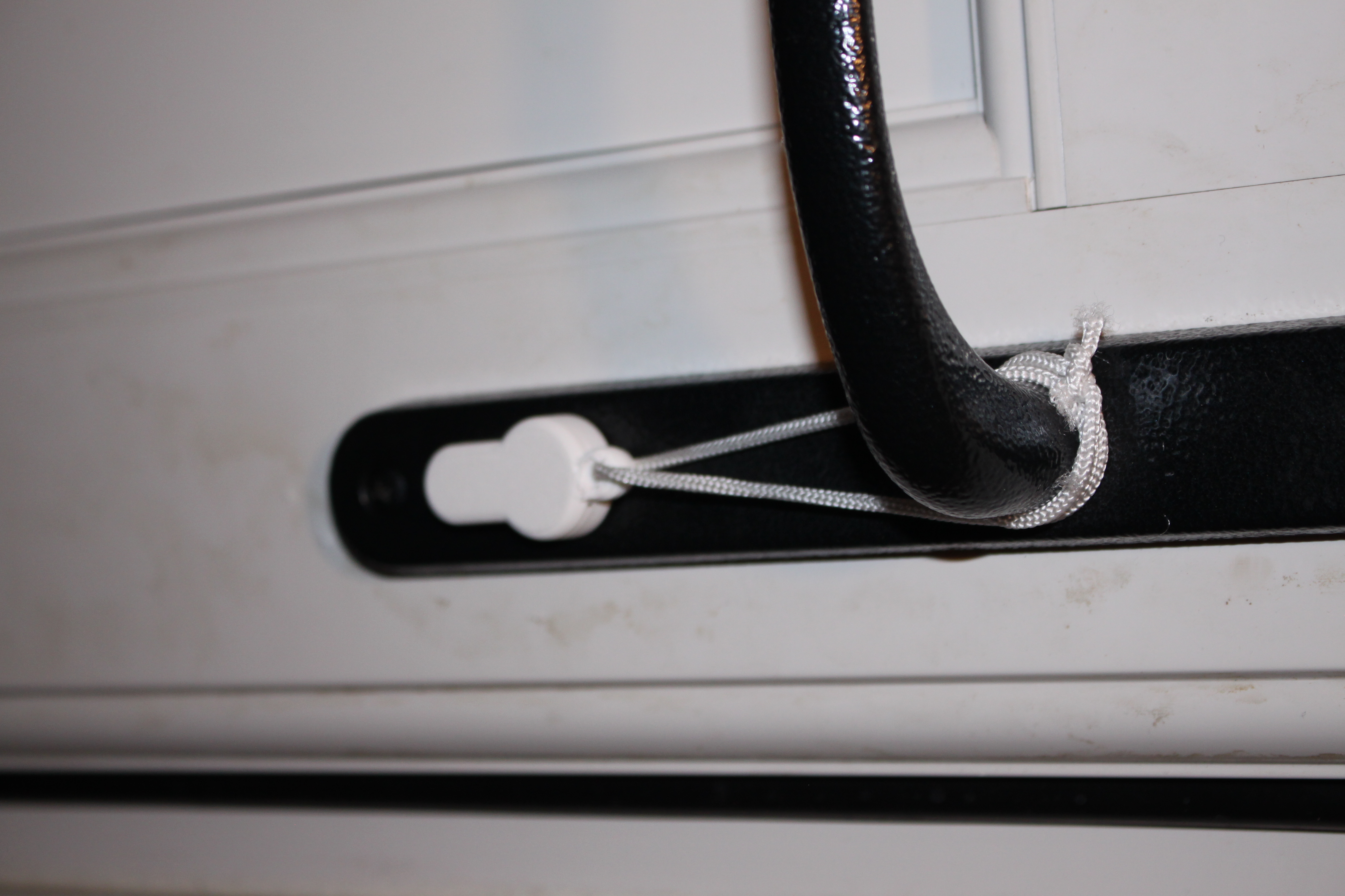 Keyhole Cover with string connector