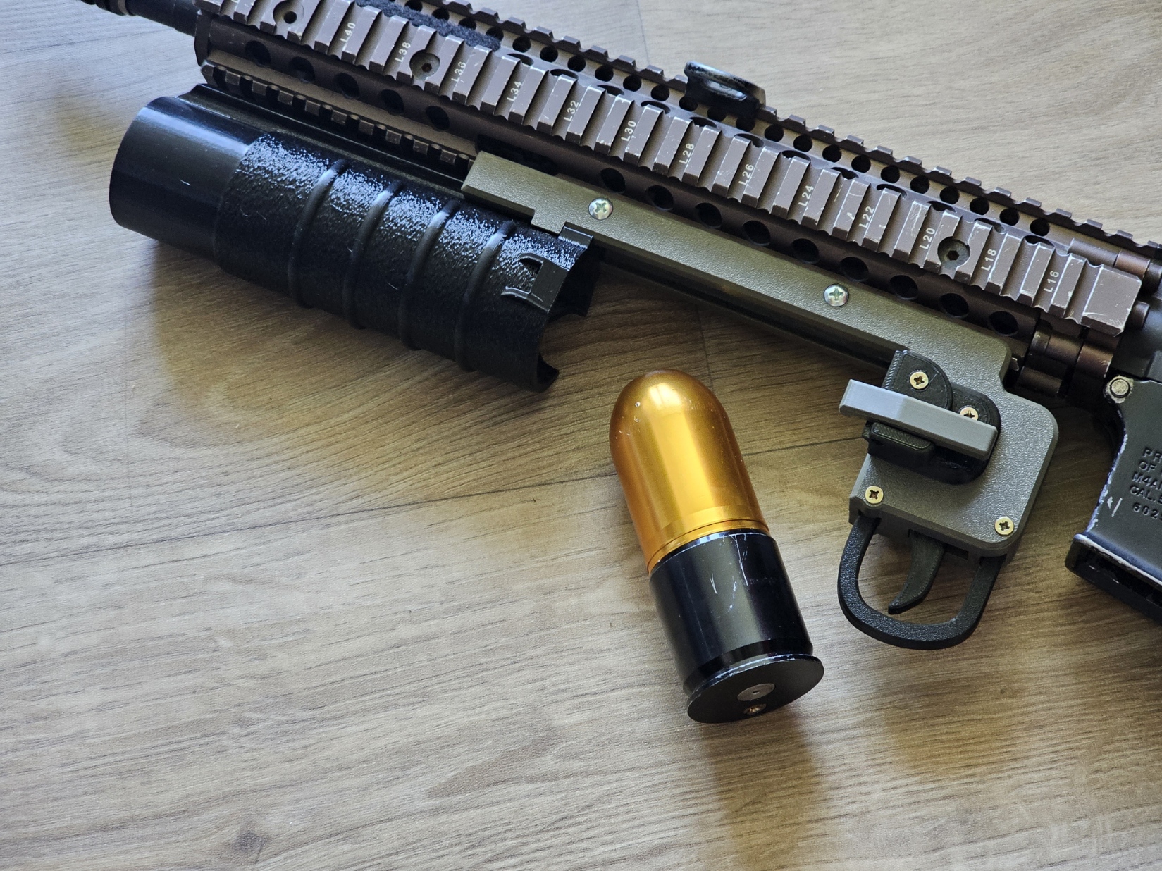Airsoft underbarrel grenade launcher