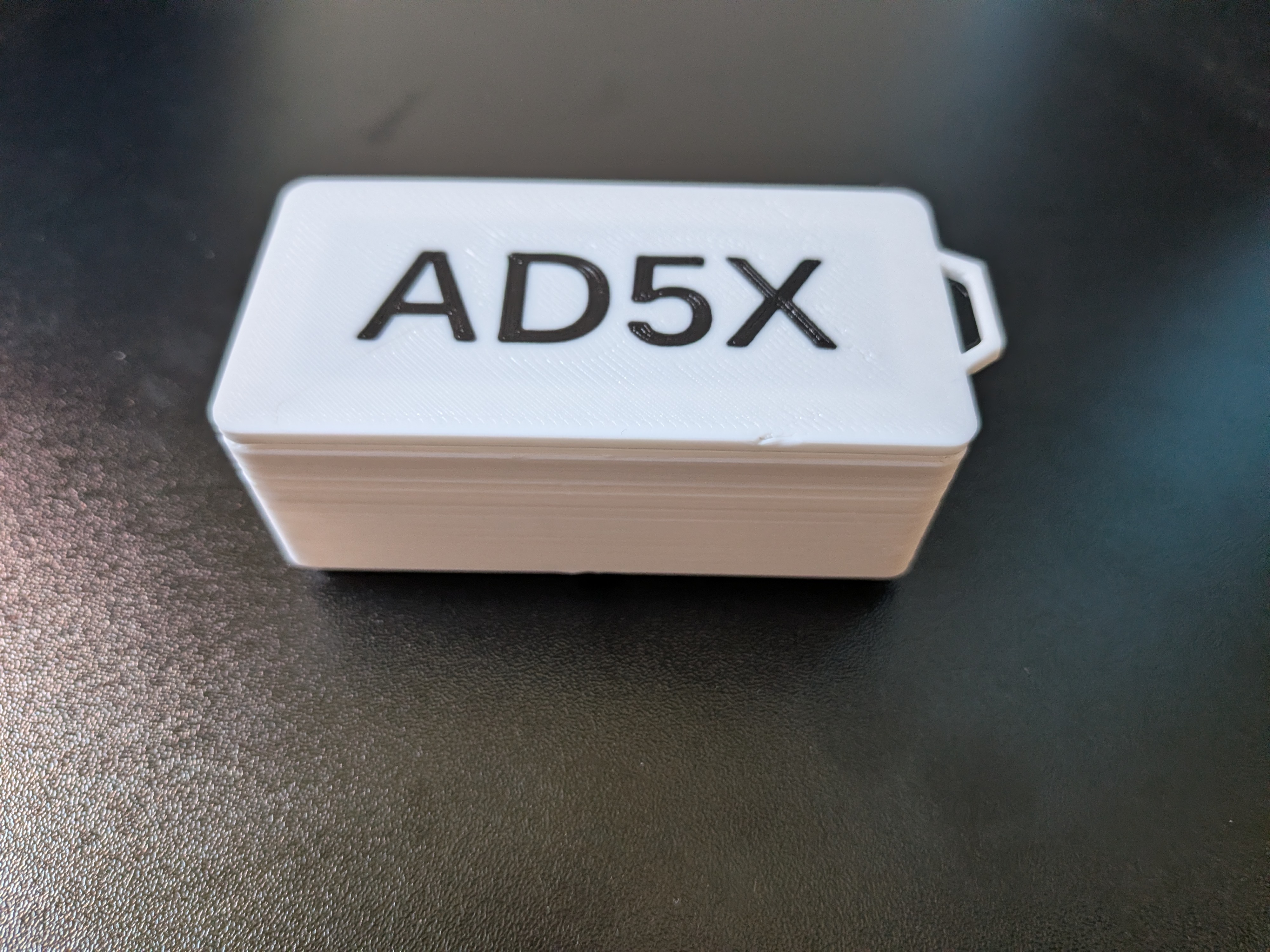 Gridfinity nozzle bin with replaceable labels + lid, for Flashforge AD5X — miniatura 4