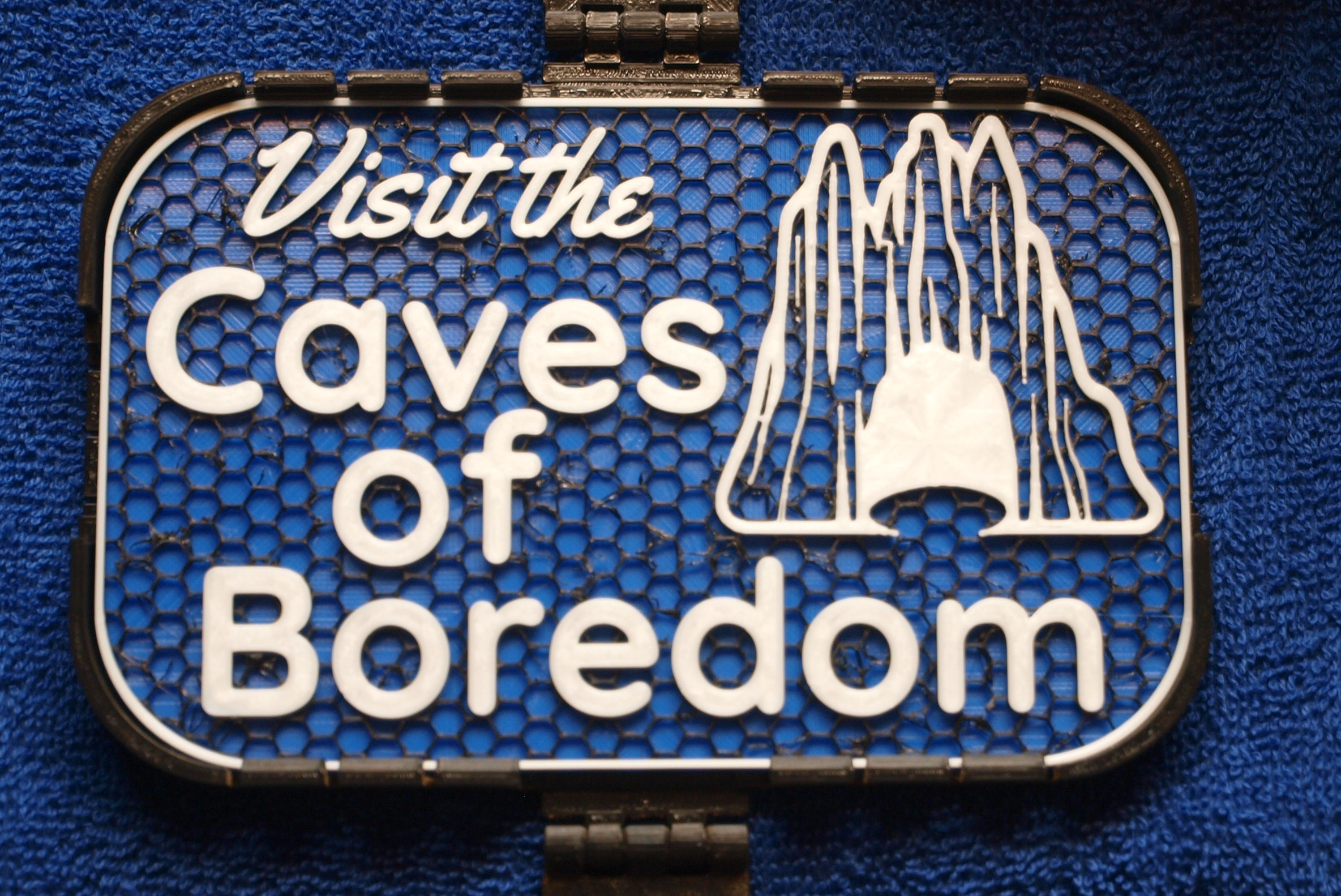 Caves of Boredom sign