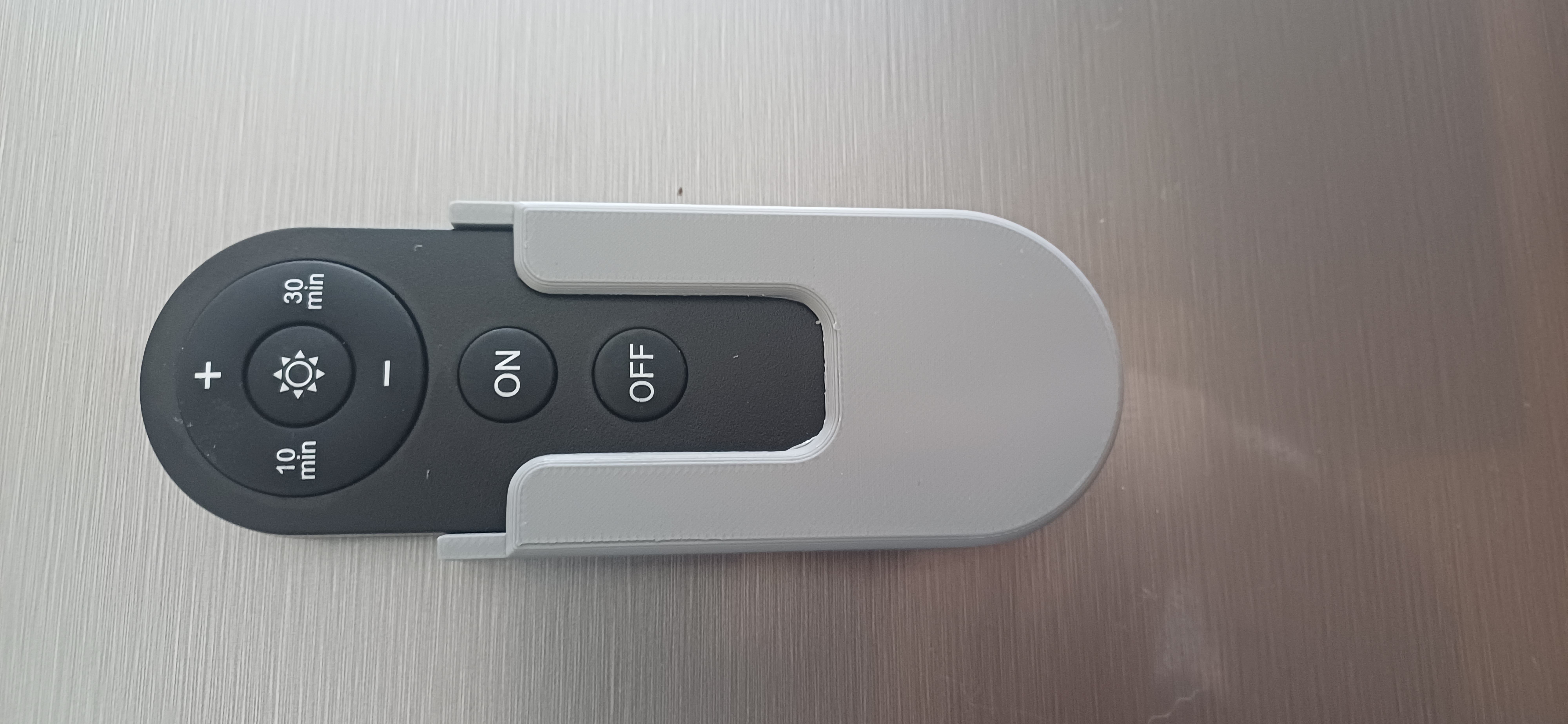 Magnetic remote-controlled holder