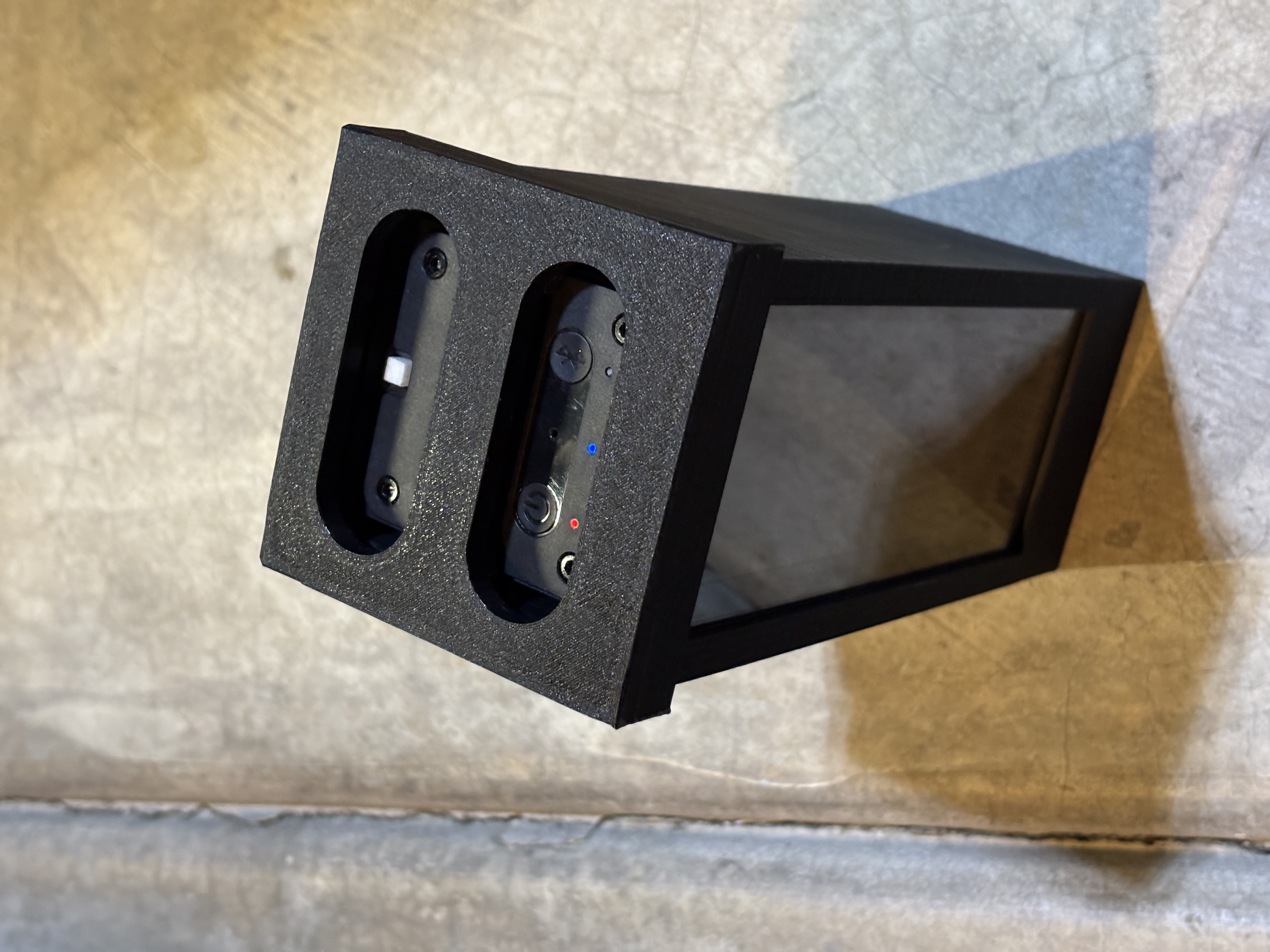 Square Golf Launch Monitor Enclosure V2 with accessible buttons and battery
