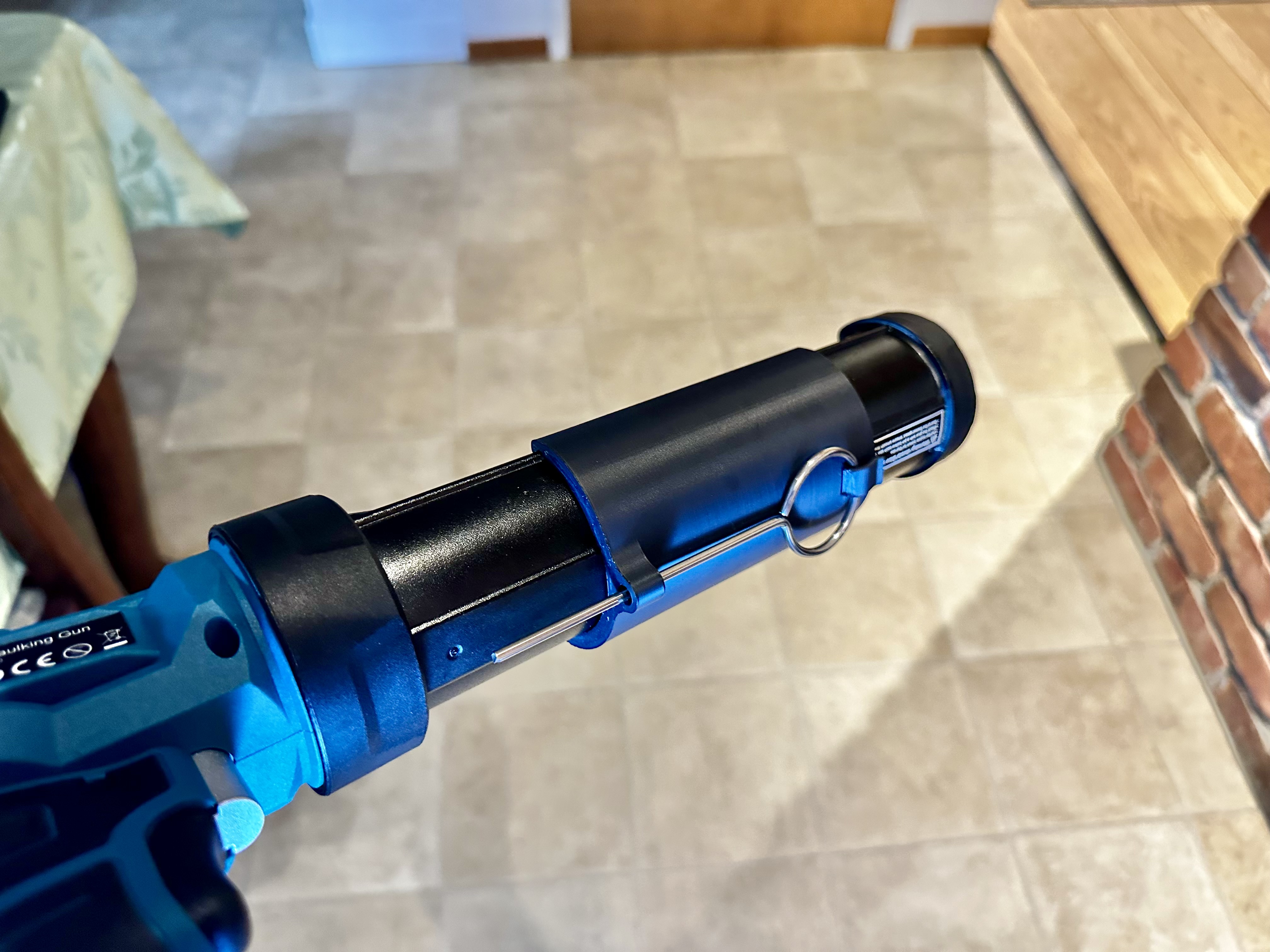 Caulk Gun Opener Holder