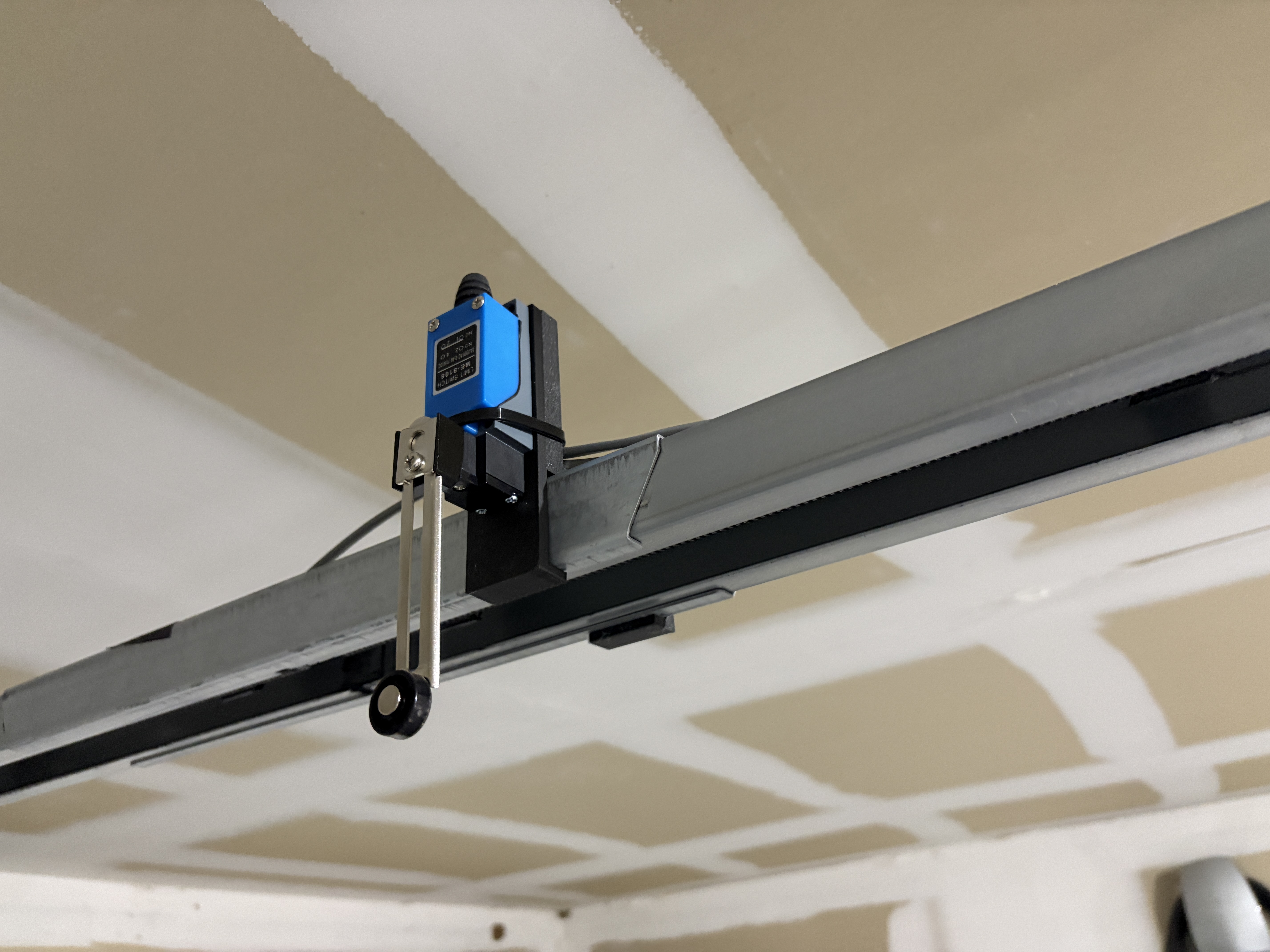Garage door limit switch brackets for Genie screw drive garage door