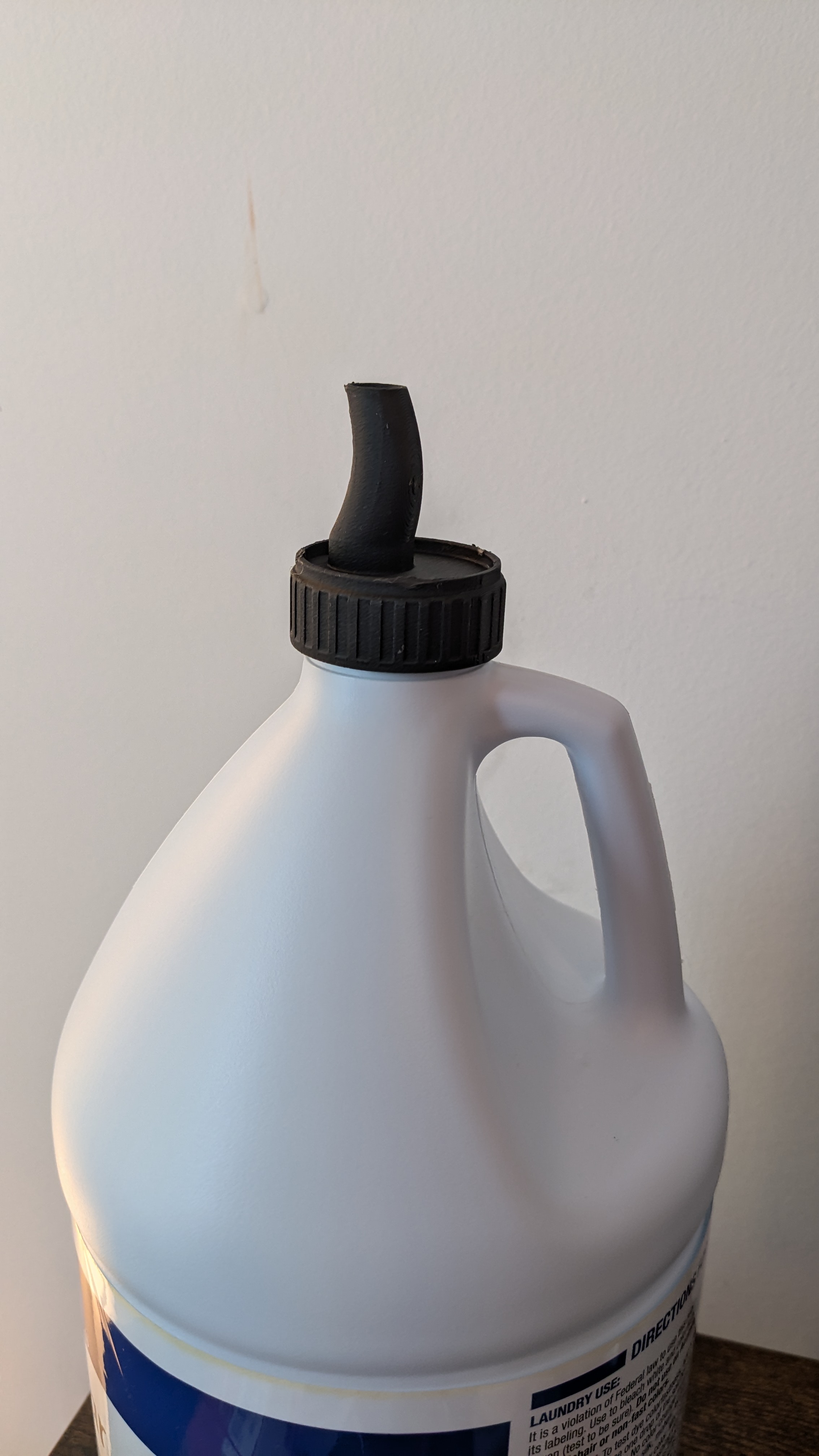 Bleach bottle spout