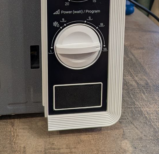 Microwave oven button