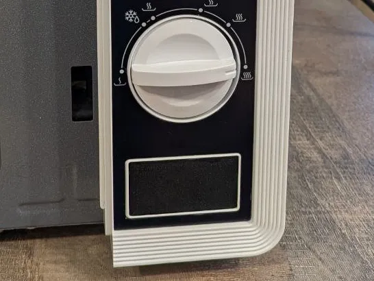 Microwave oven button