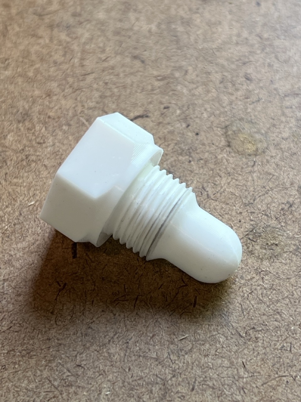 Chainsaw sparkplug piston stop