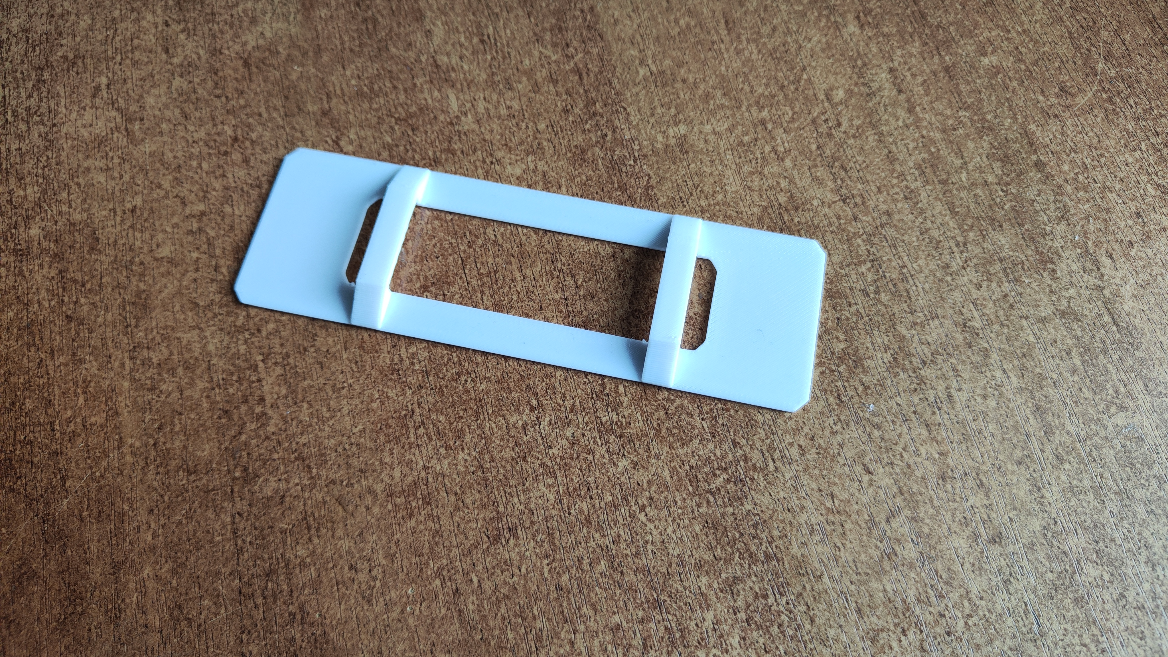 Universal LiPo battery plate for velcro strap