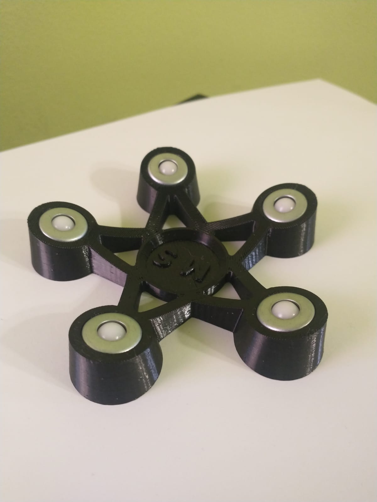 Bowling ball spinner, plastic bearing