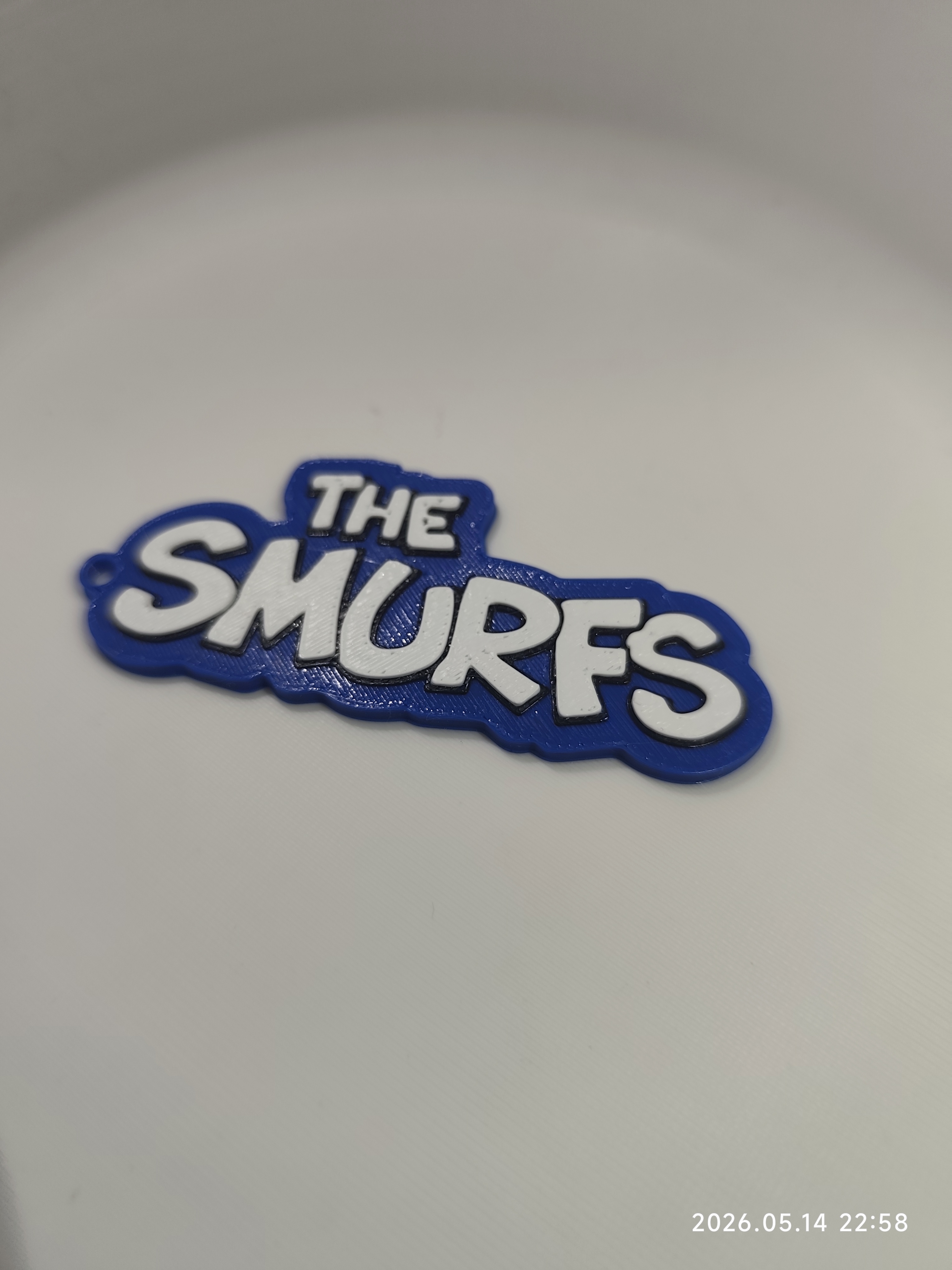 The Smurfs logo keychain