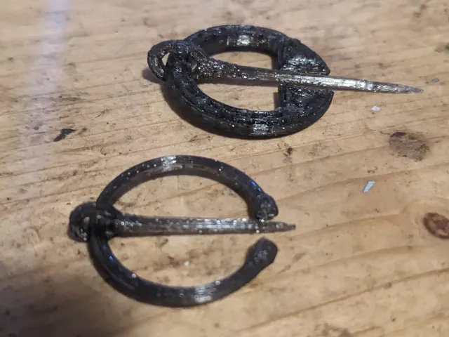 Cloak pins