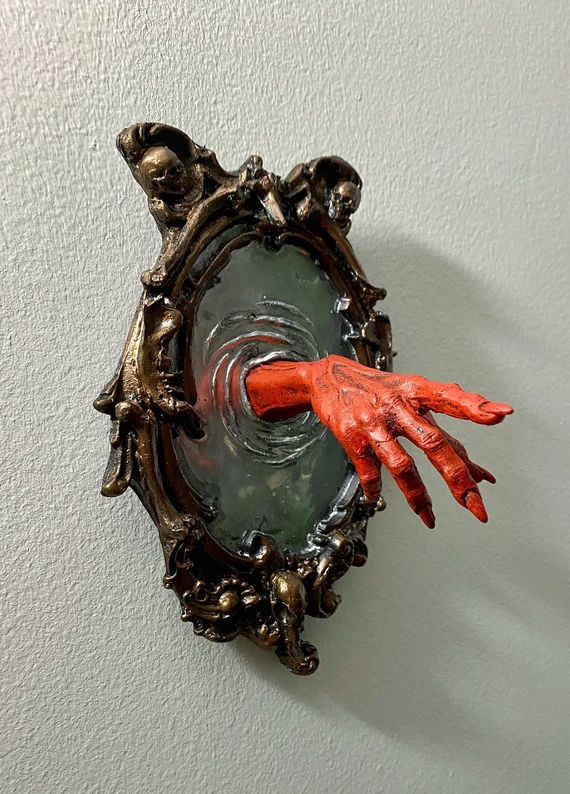 hand coming through portal