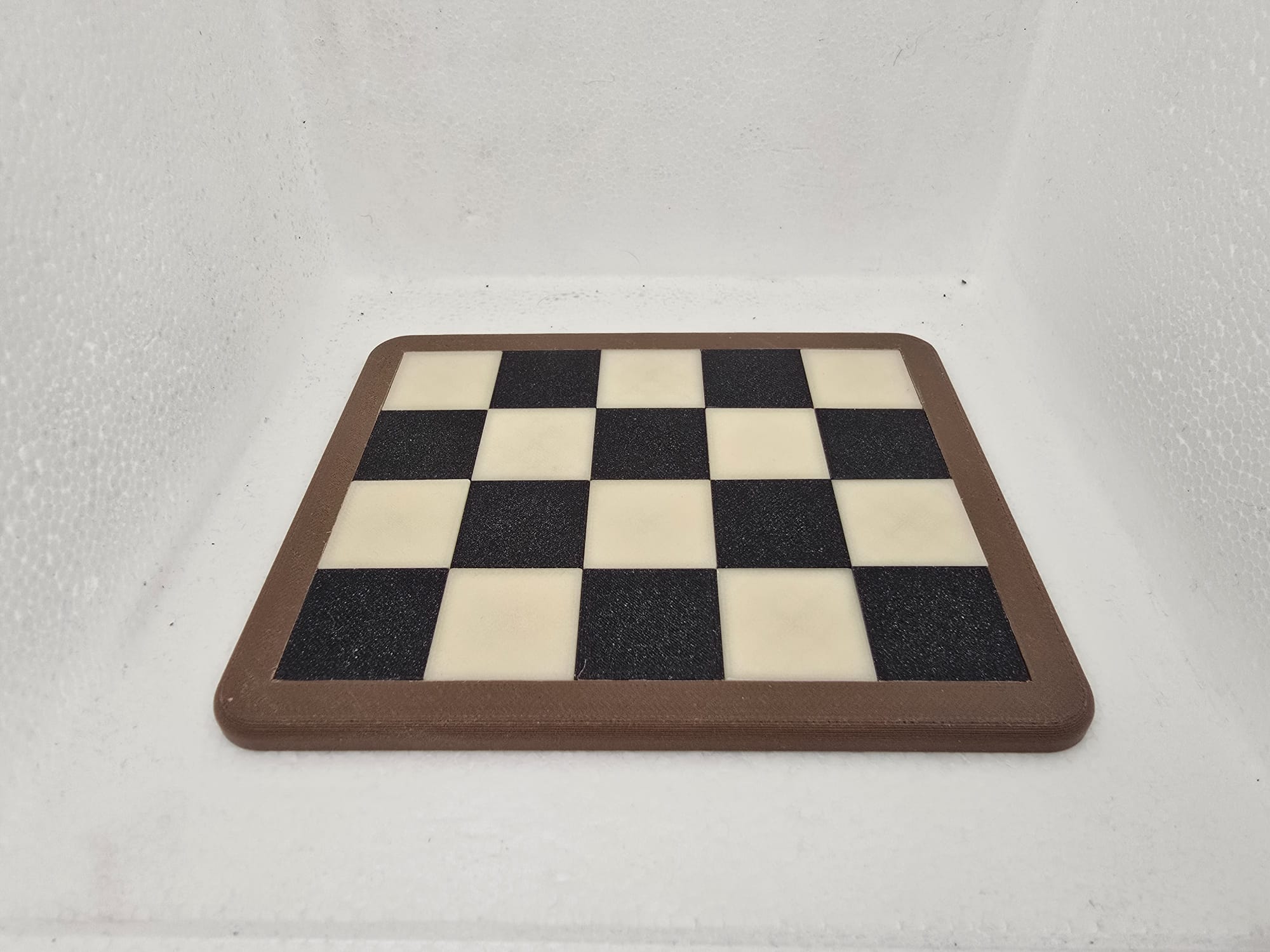 Microchess top plate with hole