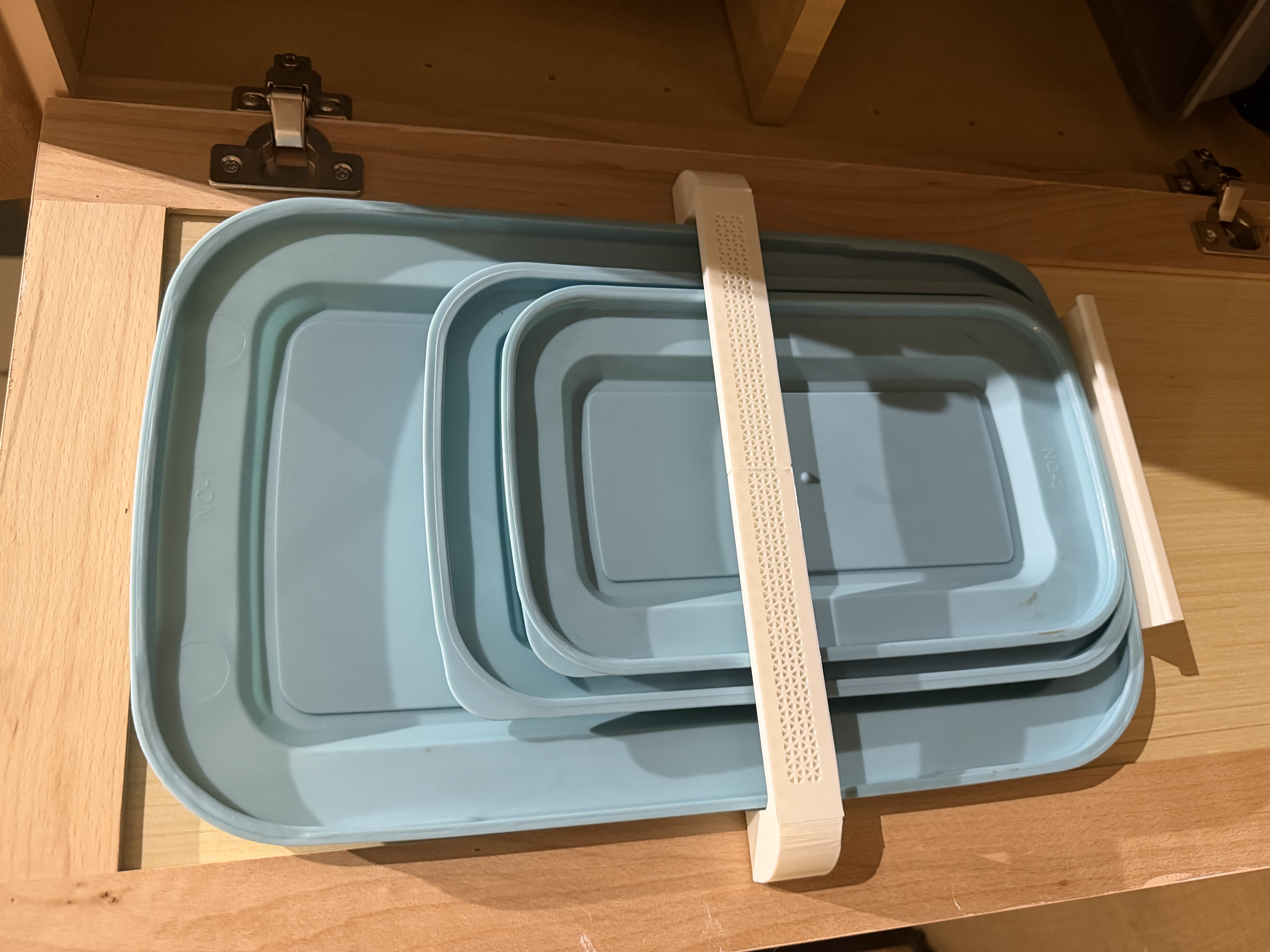 Cabinet Door Mounted Lids Holder