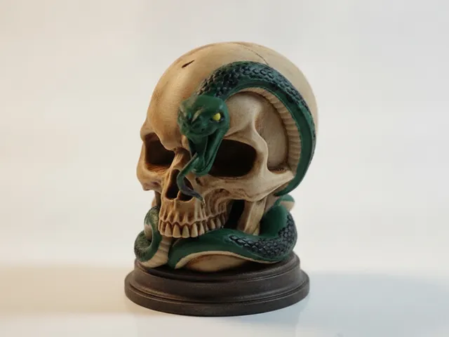 Skull With Snake Crawling Through Eye Socket Figurine 3D Printable
